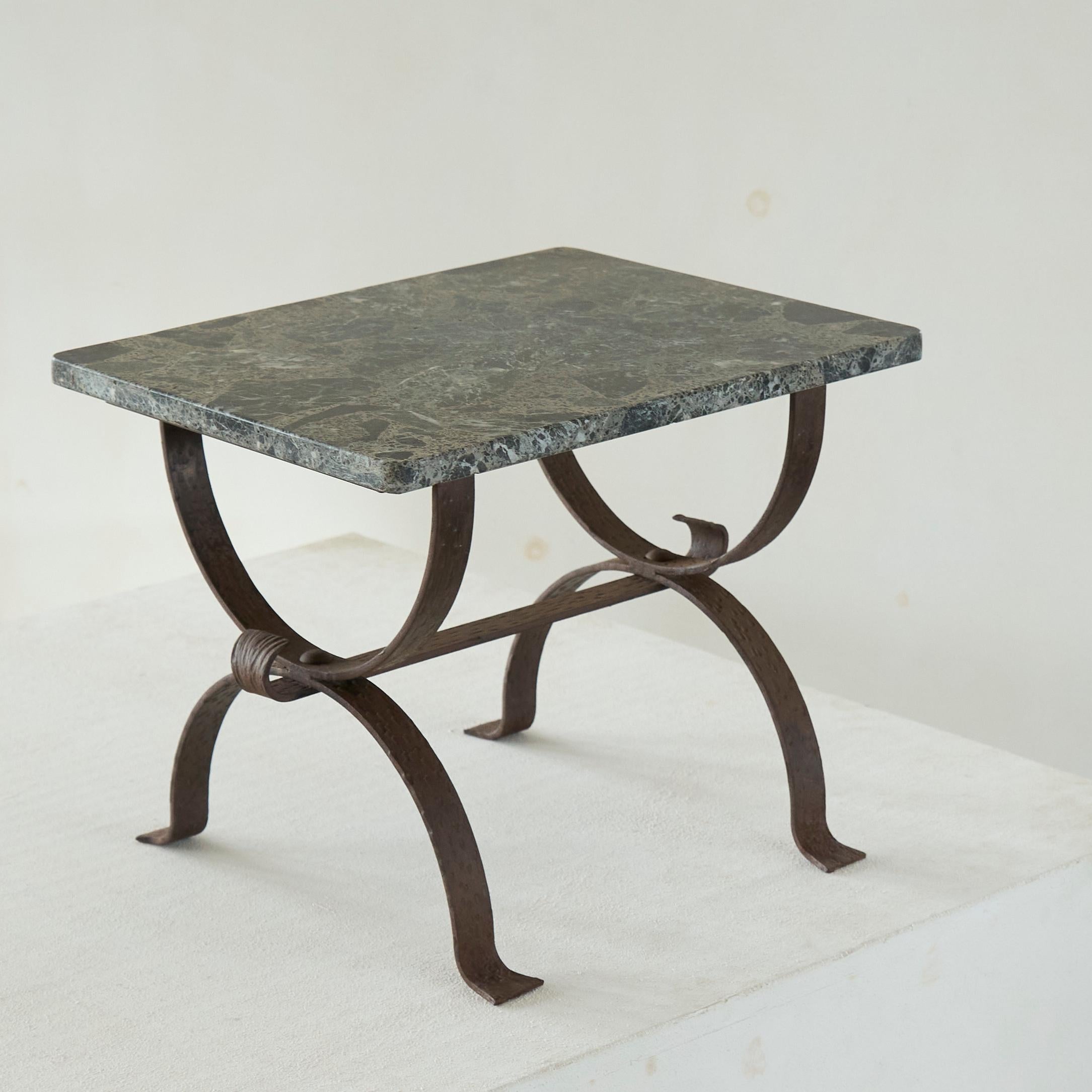Art Deco Side Table in Wrought Iron and Marble.

Wonderful side or occasional table in hand wrought iron with a period marble top. Very elegant design and a slab of marble to dream of. Just a very good item on a porch, veranda or in your garden.