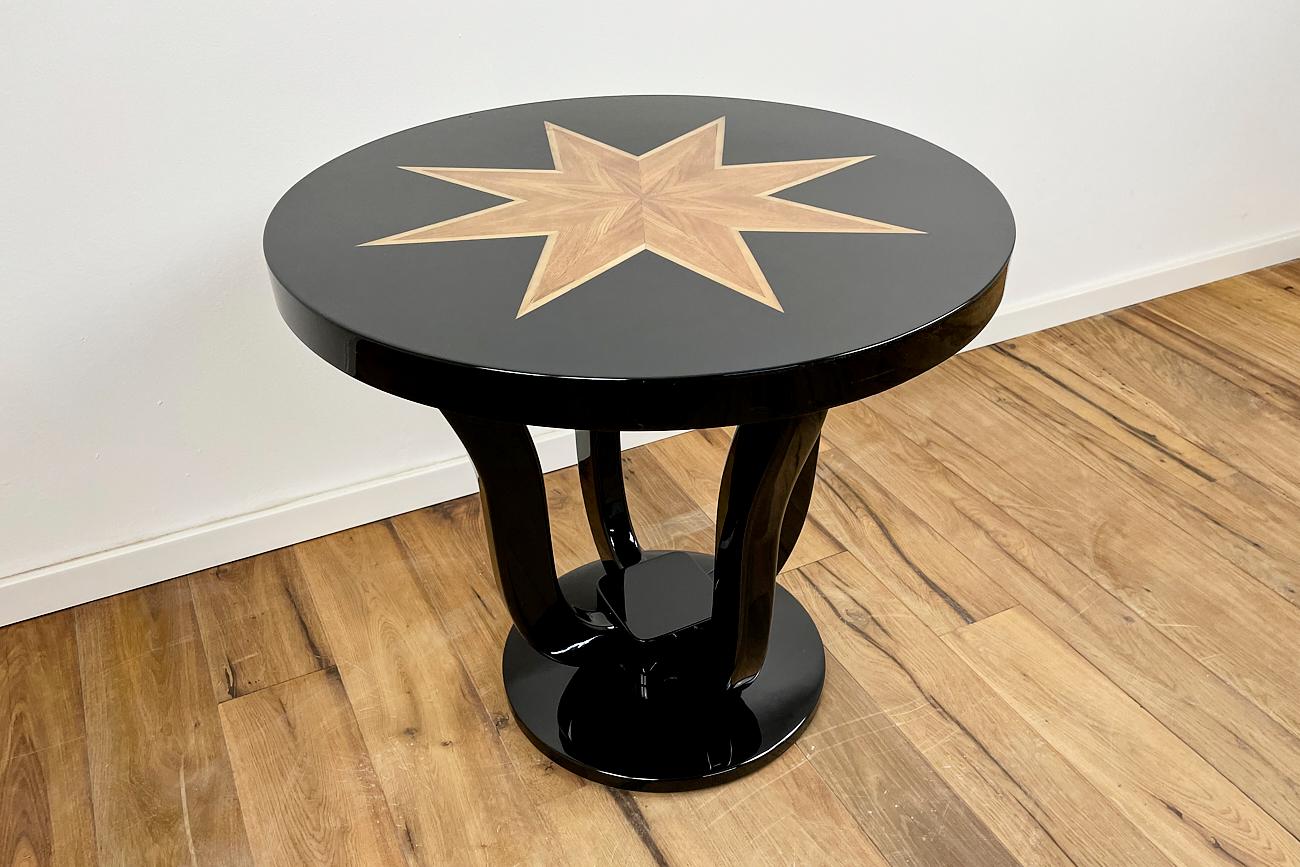 Unique side table with beautiful inlay work - shown is a star made of ash with a maple border. A very valuable and rare table from German Art Deco that will enrich your living space. The entire piece of furniture is provided with a multi-layer