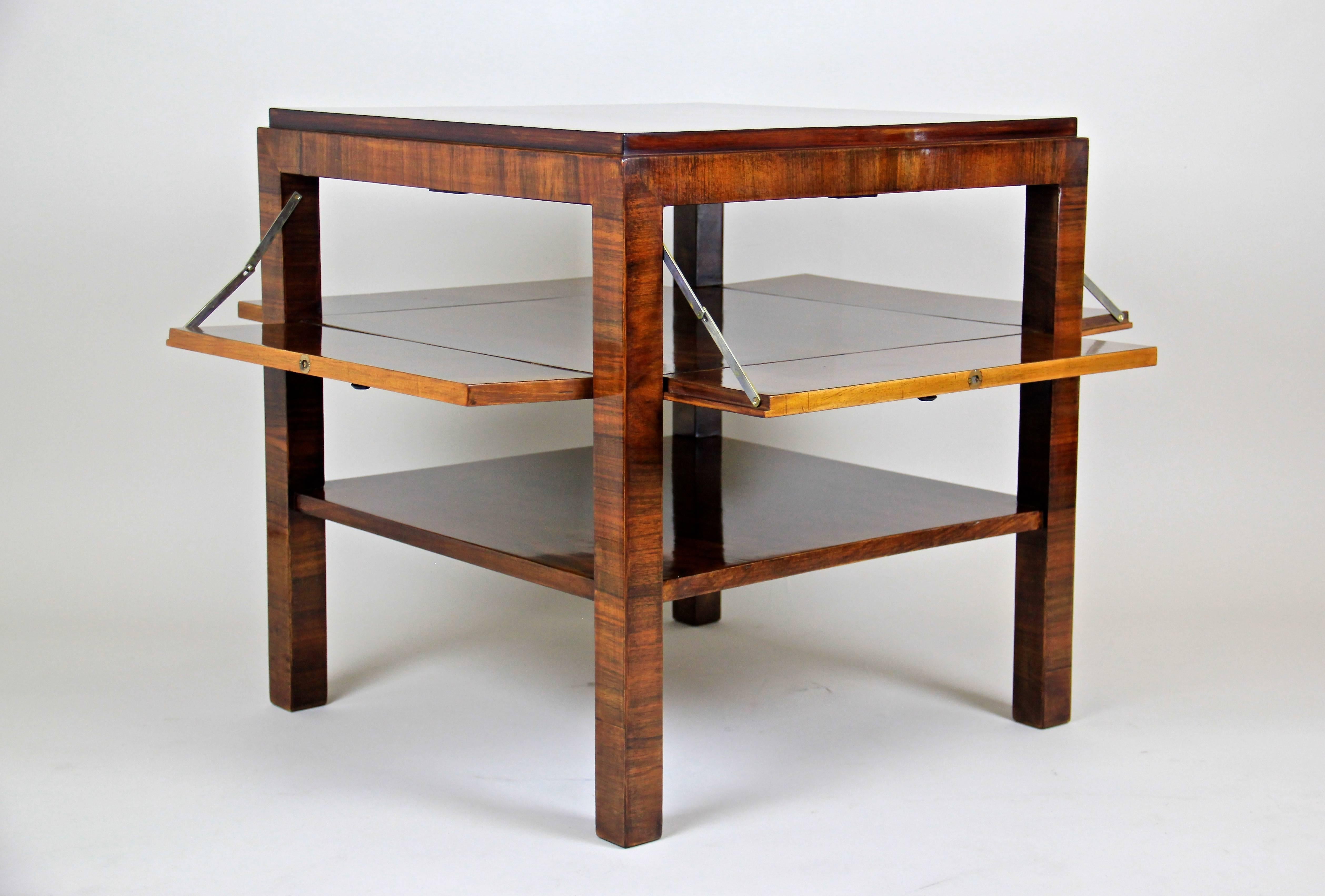 Unusual Art Deco side table from the period Austria, circa 1920. This exceptional piece of early Art Deco history comes with an elegant timeless square shape featuring a hidden compartment that can be reached by four small doors, means from every