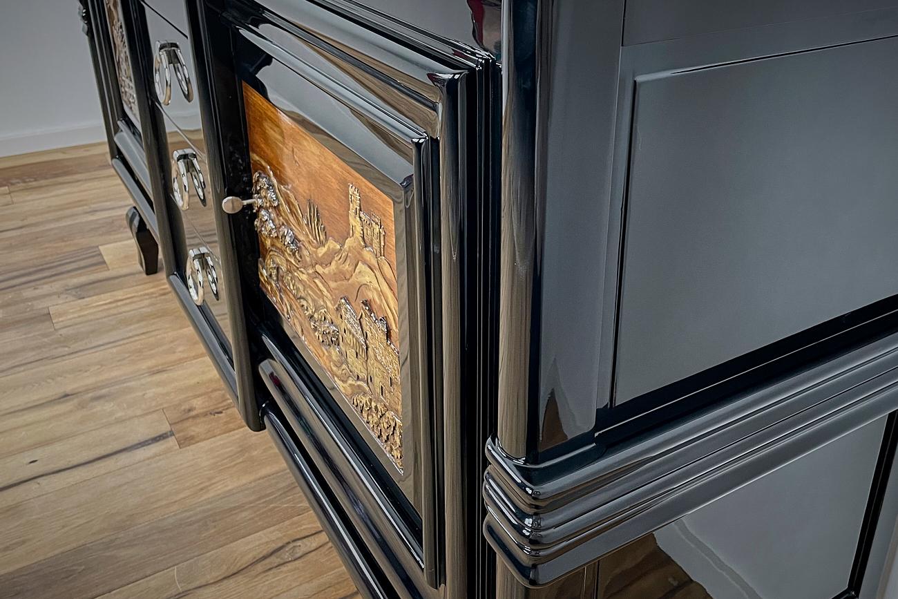 Lacquered Art Deco Sideboard Around 1930 with Two Carved Paintings For Sale