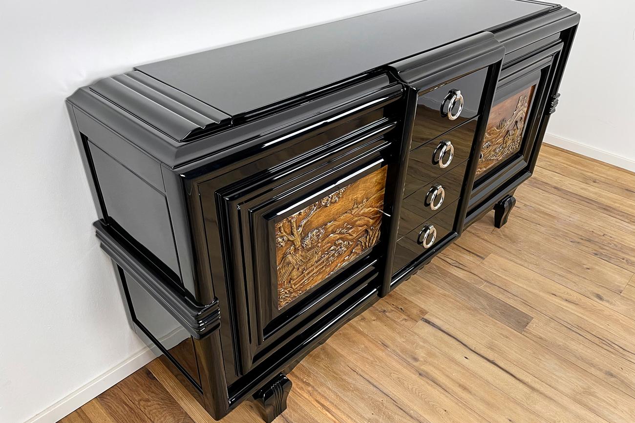 Mid-20th Century Art Deco Sideboard Around 1930 with Two Carved Paintings For Sale