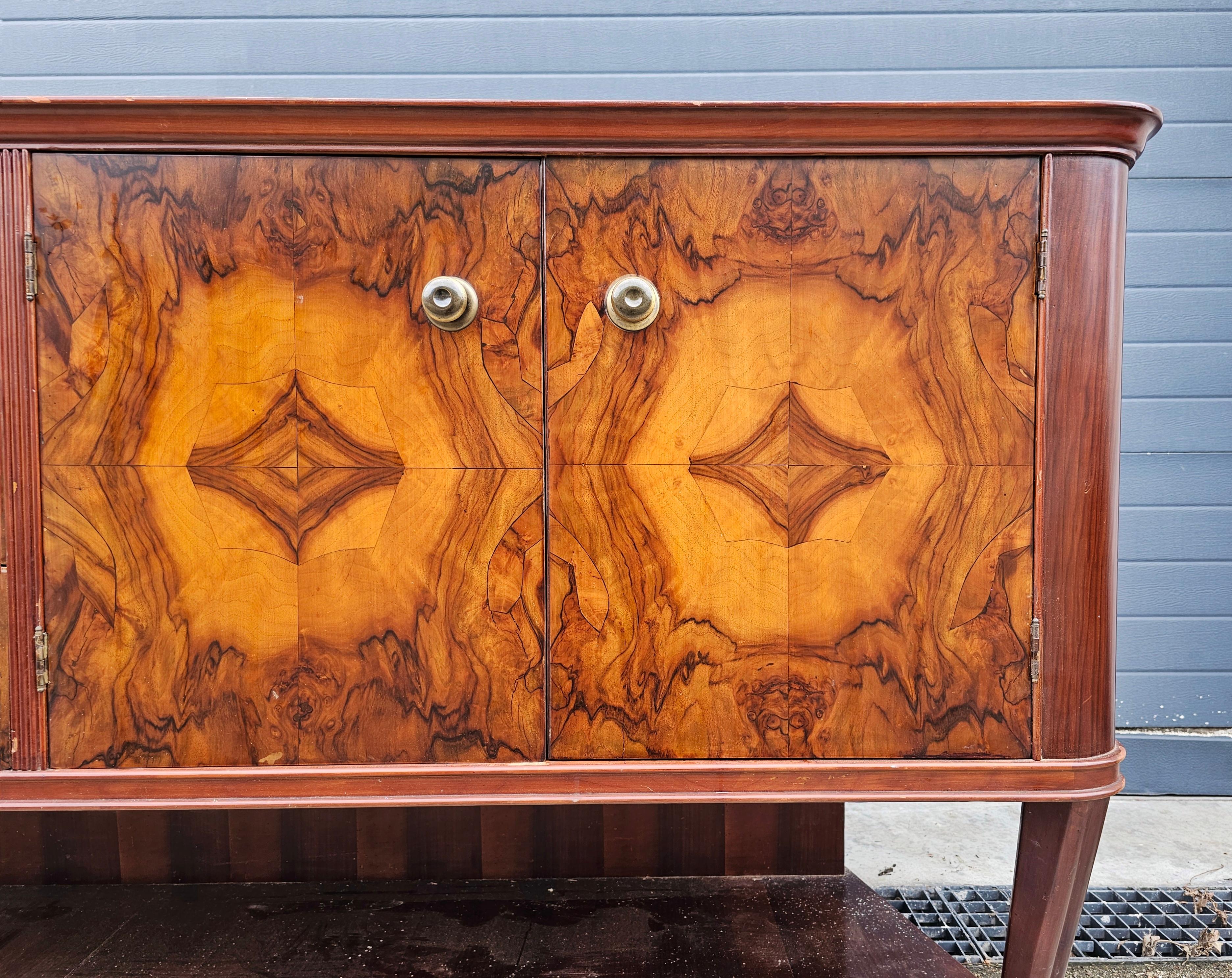 Mid-20th Century Art Deco Sideboard done in burl walnut veneer with rich and dramatic grain For Sale