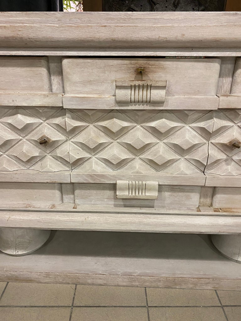 An bleached oak sideboard by Charles Dudouyt, circa 1930.
 