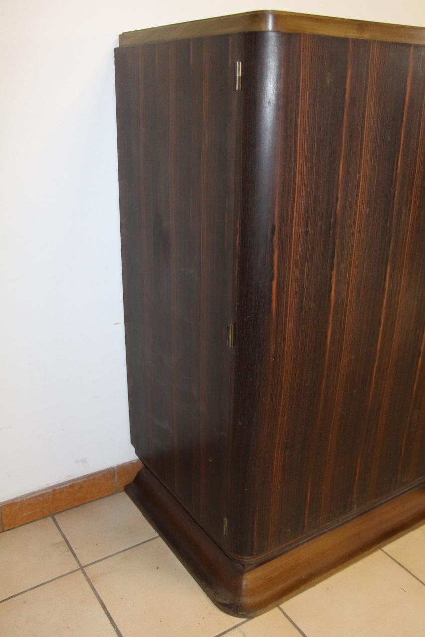 Large row of Art Deco period mahogany and Macassar veneer in good house condition, have small traces of daily use attributed to Auguste Vallin.