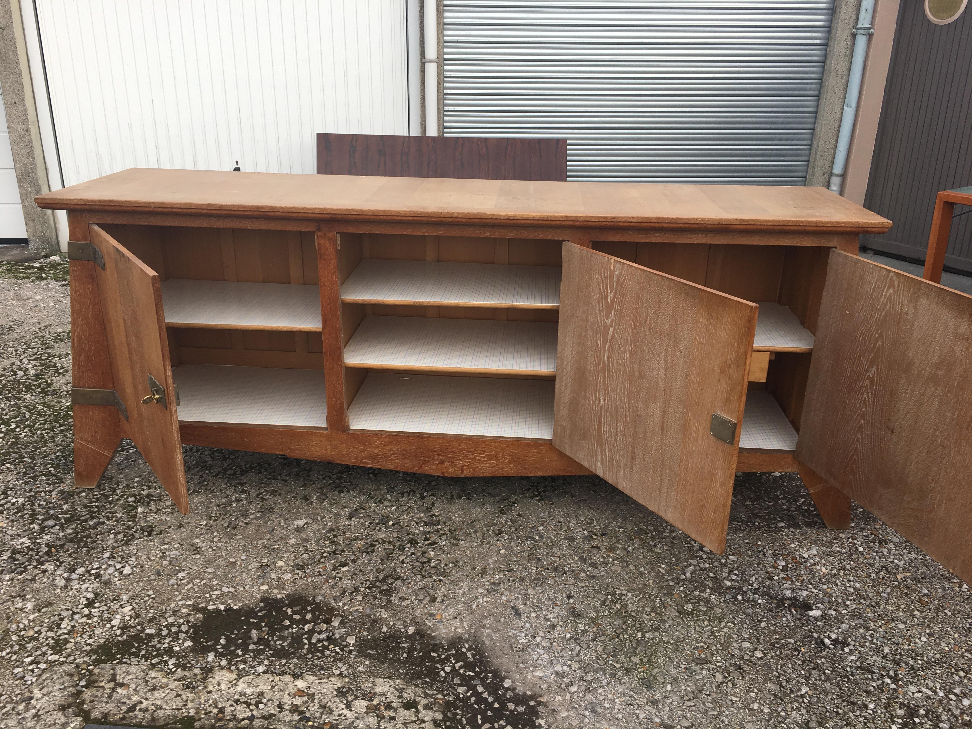 European Art Deco Sideboard in Solid Oak in the style of Charles Dudouyt , circa 1940 For Sale