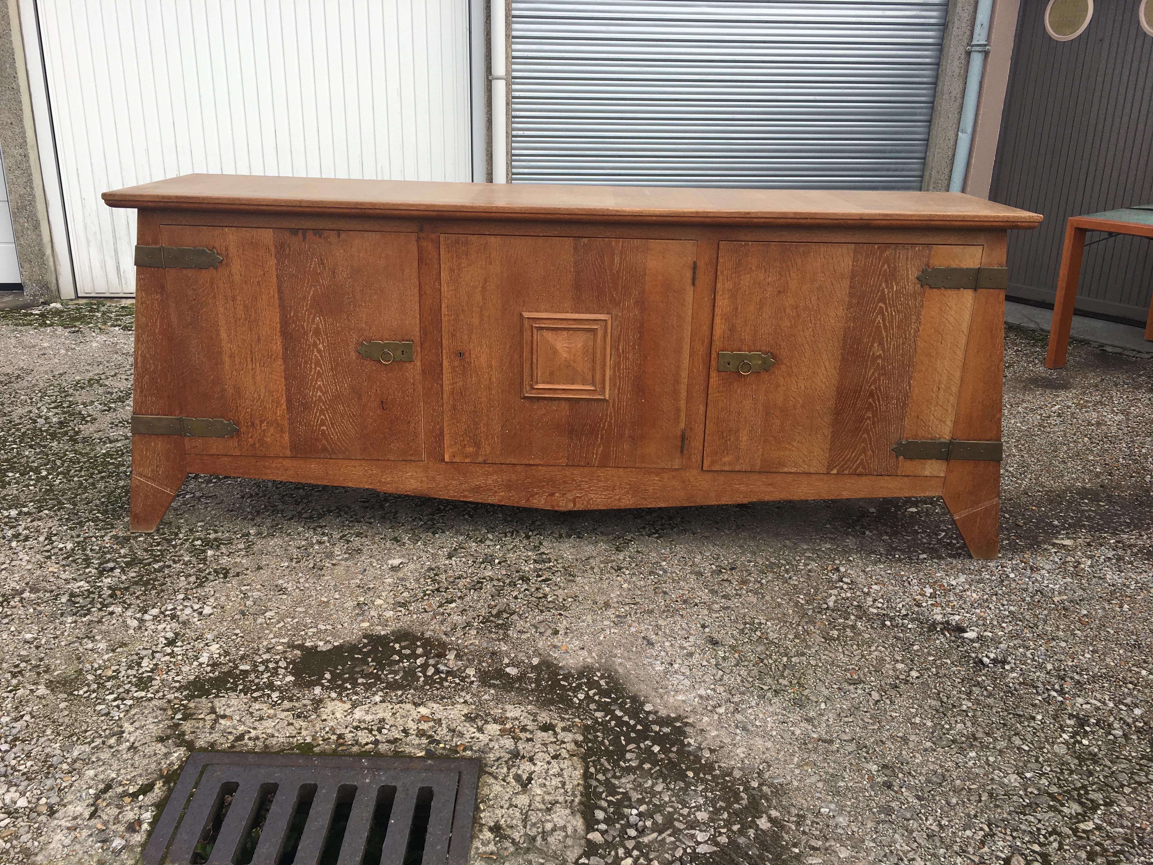 Mid-20th Century Art Deco Sideboard in Solid Oak in the style of Charles Dudouyt , circa 1940 For Sale