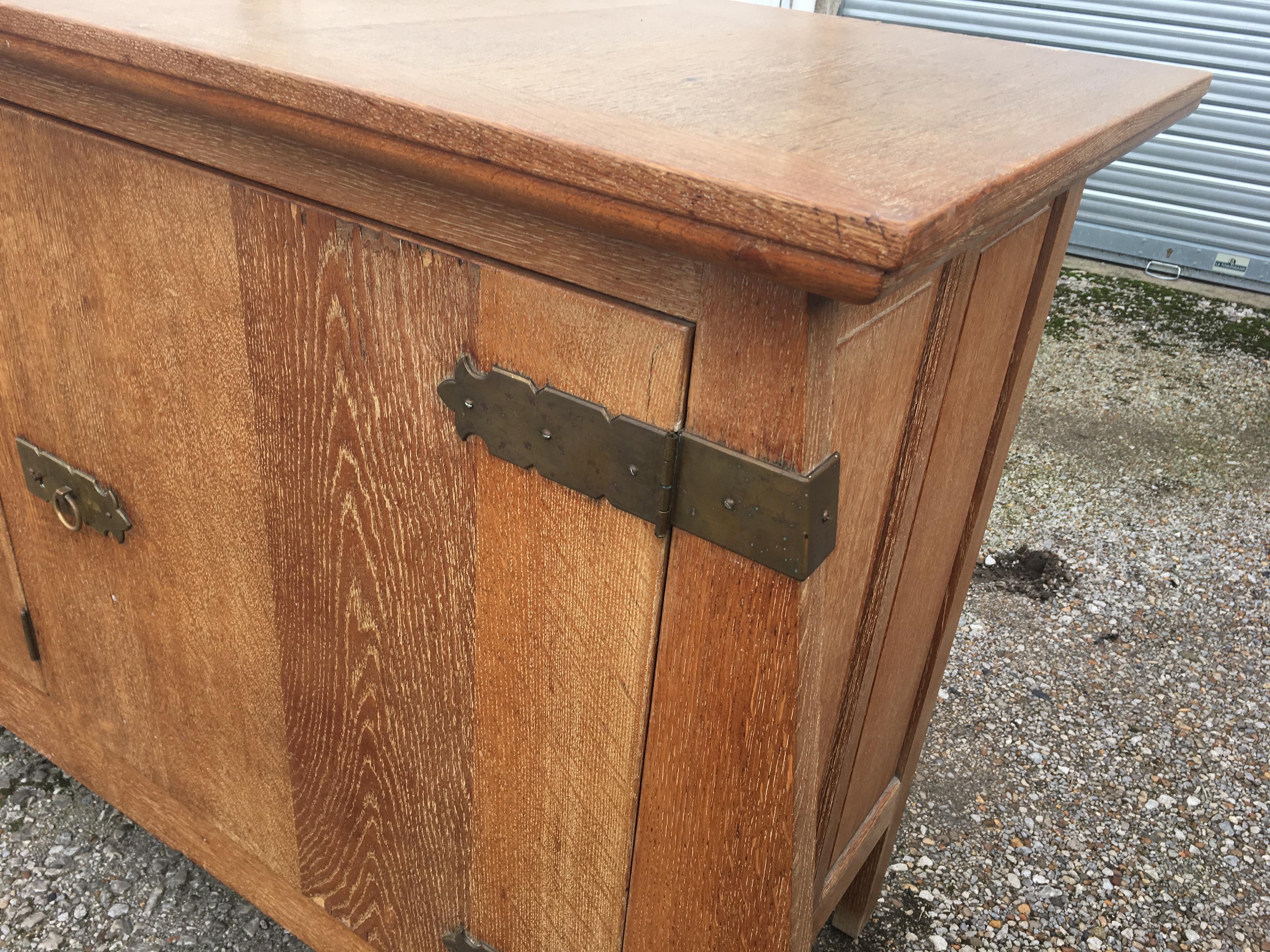 Brass Art Deco Sideboard in Solid Oak in the style of Charles Dudouyt , circa 1940 For Sale