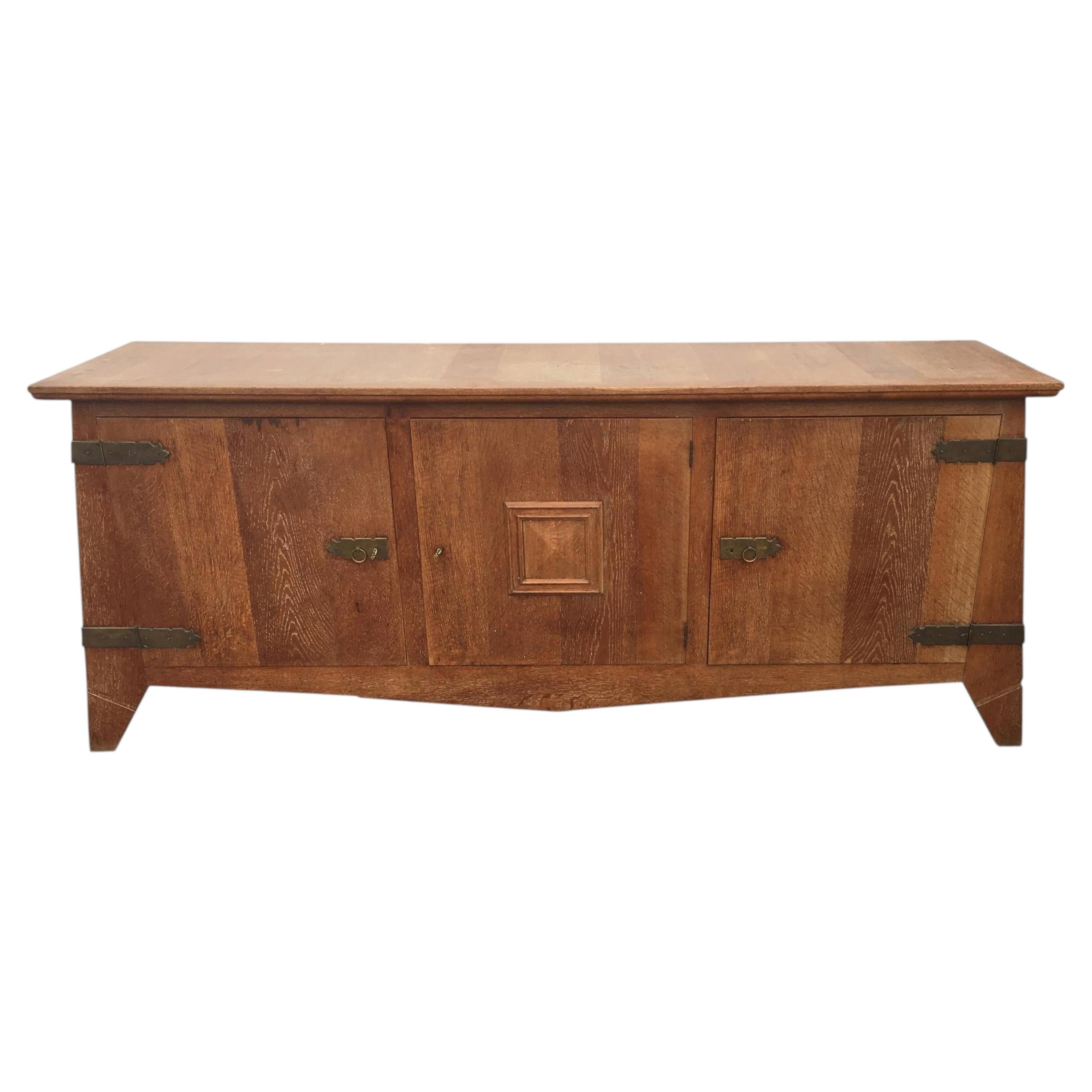 Art Deco Sideboard in Solid Oak in the style of Charles Dudouyt , circa 1940