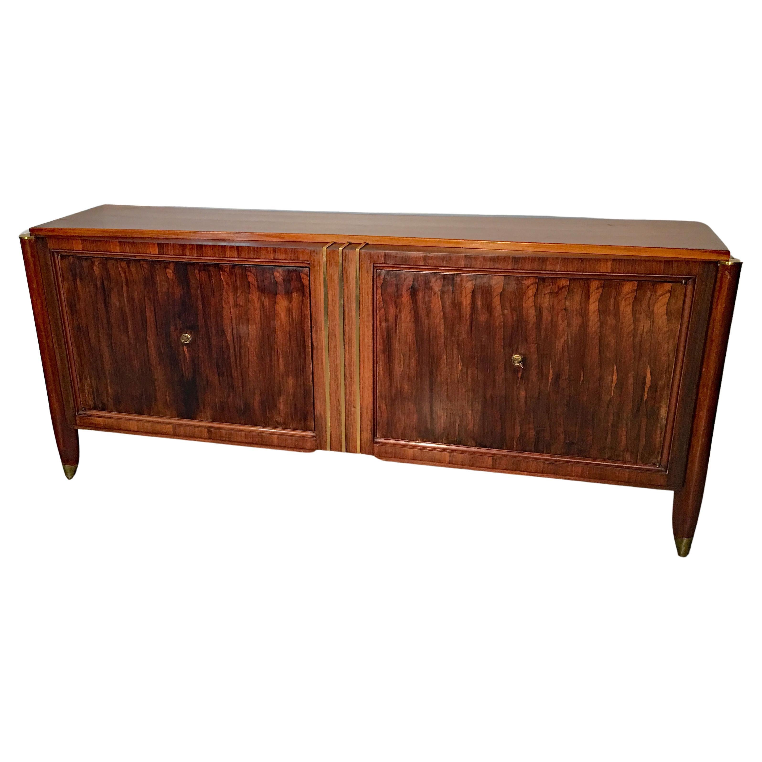 Art Deco sideboard in walnut and bronze in the style of Dominique.
Interior in sycamore,
circa 1930.
Need a new polish.
 