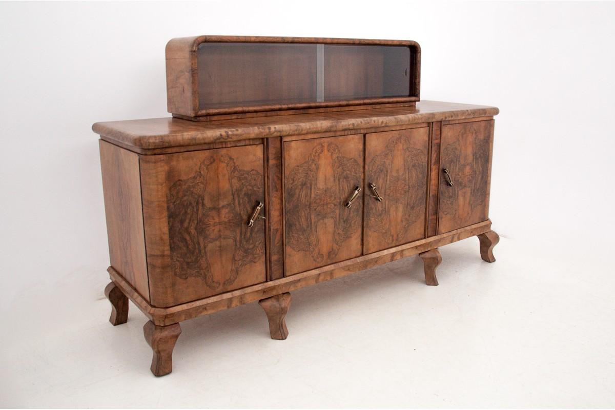 Art Deco sideboard, Poland, 1930s.

Very good condition.

Wood: walnut

dimensions: height 135 cm, width 222 cm, depth 68 cm.