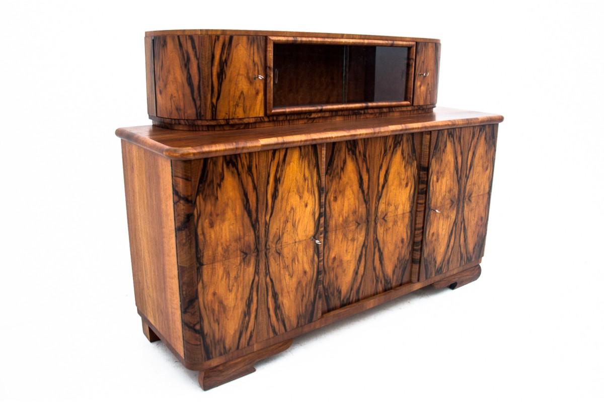Art Deco sideboard from the 1940s.

Furniture in very good condition, after professional renovation.

Dimensions: height 133 cm / width 189 cm / depth 60 cm