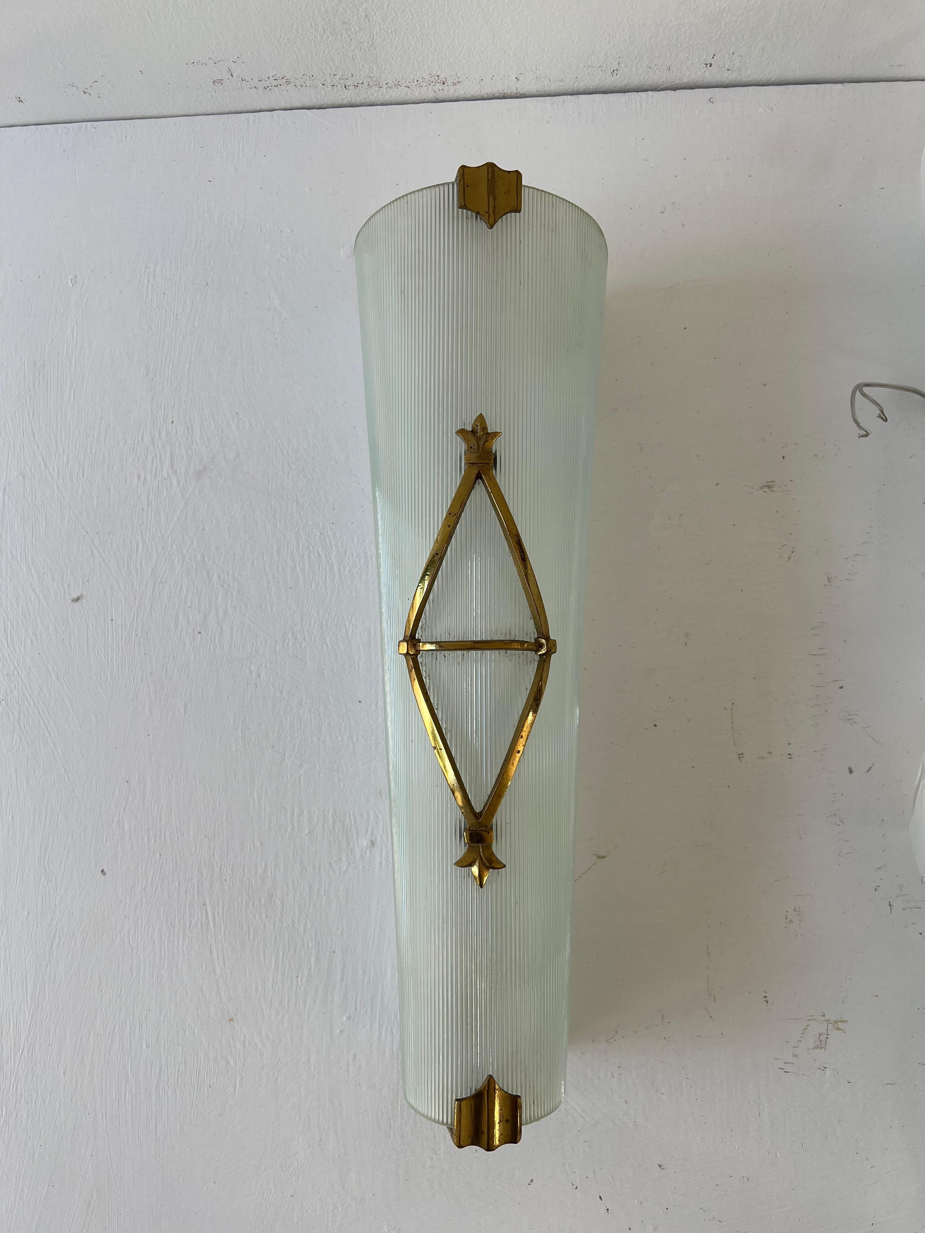 Large Art Deco Sconce in optical pressed glass and brass or bronze hardware, both 