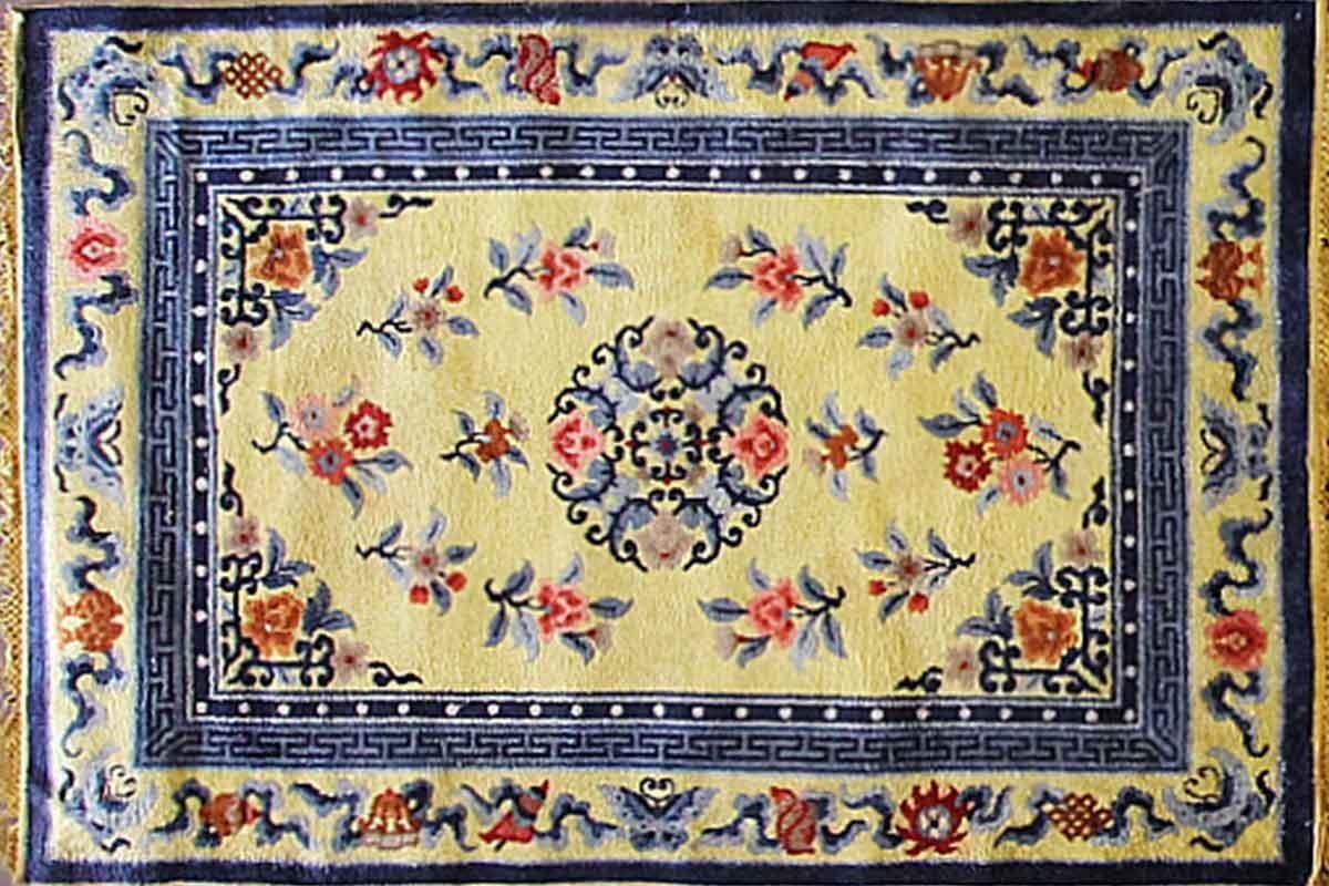Art Deco Chinese silk rug, the sun.

This wonderful Art Deco carpet was made in China, circa 1910s or 1920's. Walter Nichols was great American rug producer (the Art Deco rugs which he did not originate them) in Tientsin. The rugs made of wool and