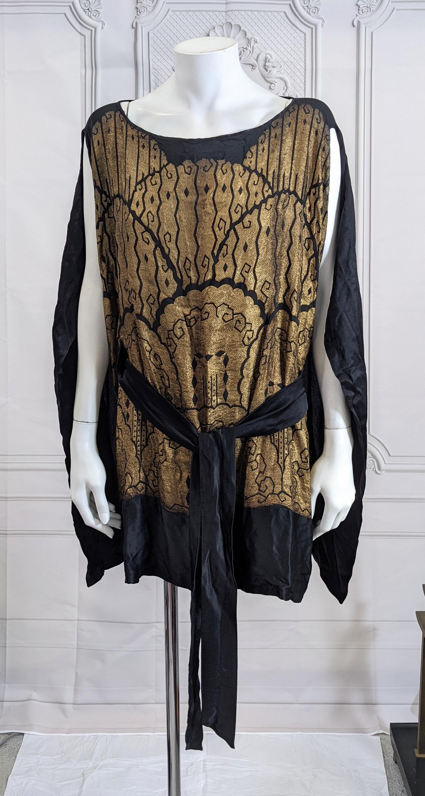 Elegant Art Deco Silk Lame Tunic constructed from the period lame scarf. Genuine gold metallic thread in Art Deco patterning on silk with stain banding. Tunic was created in the period with a hidden back panel, and added ties to secure waist.
