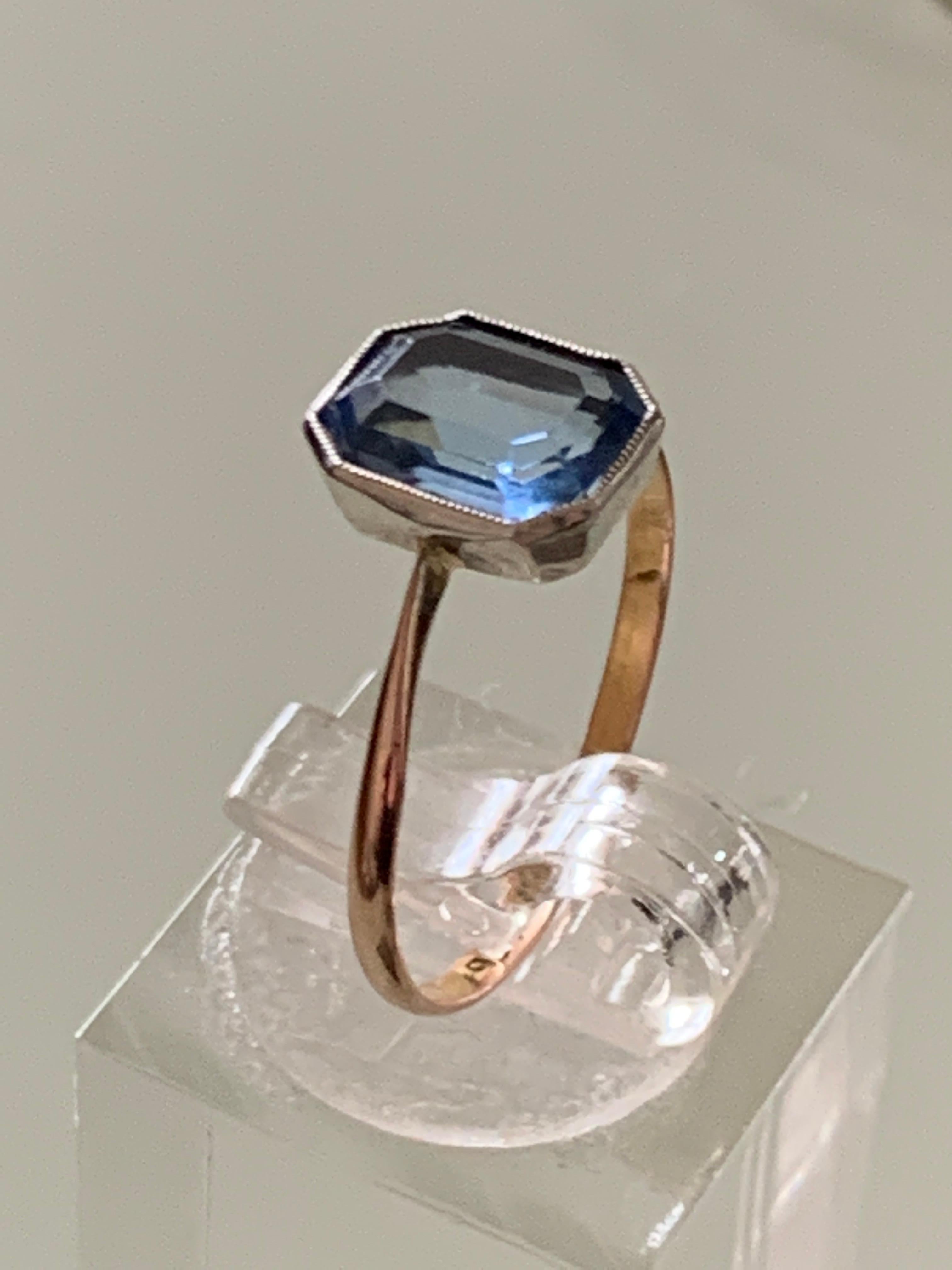 Art Deco Silver and 9ct Gold 
Aqua Marine Gemstone Ring

Circa 1910
Ring Size 18mm inner diameter
U.K P 1/2
U.S 7 3/4

Silver mount as granular edging
Stamped 9ct & Silver
The stone is in beautiful condition
and the band is a beautiful rose hint 9ct