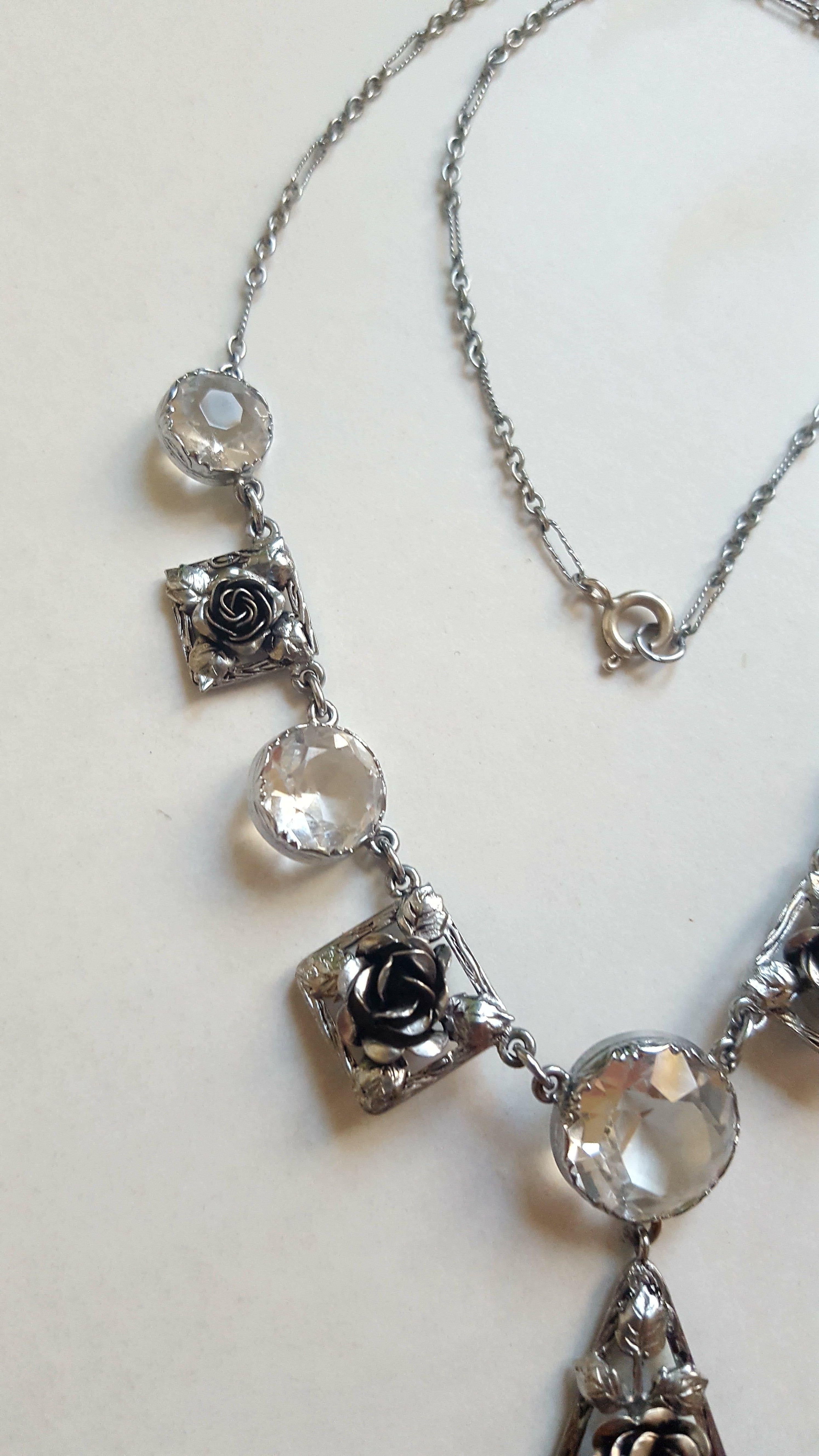 A Spectacular Art Deco c.1920s Chromium plated Solid Silver and Crystal Roses necklace. 
Length 16 1/2