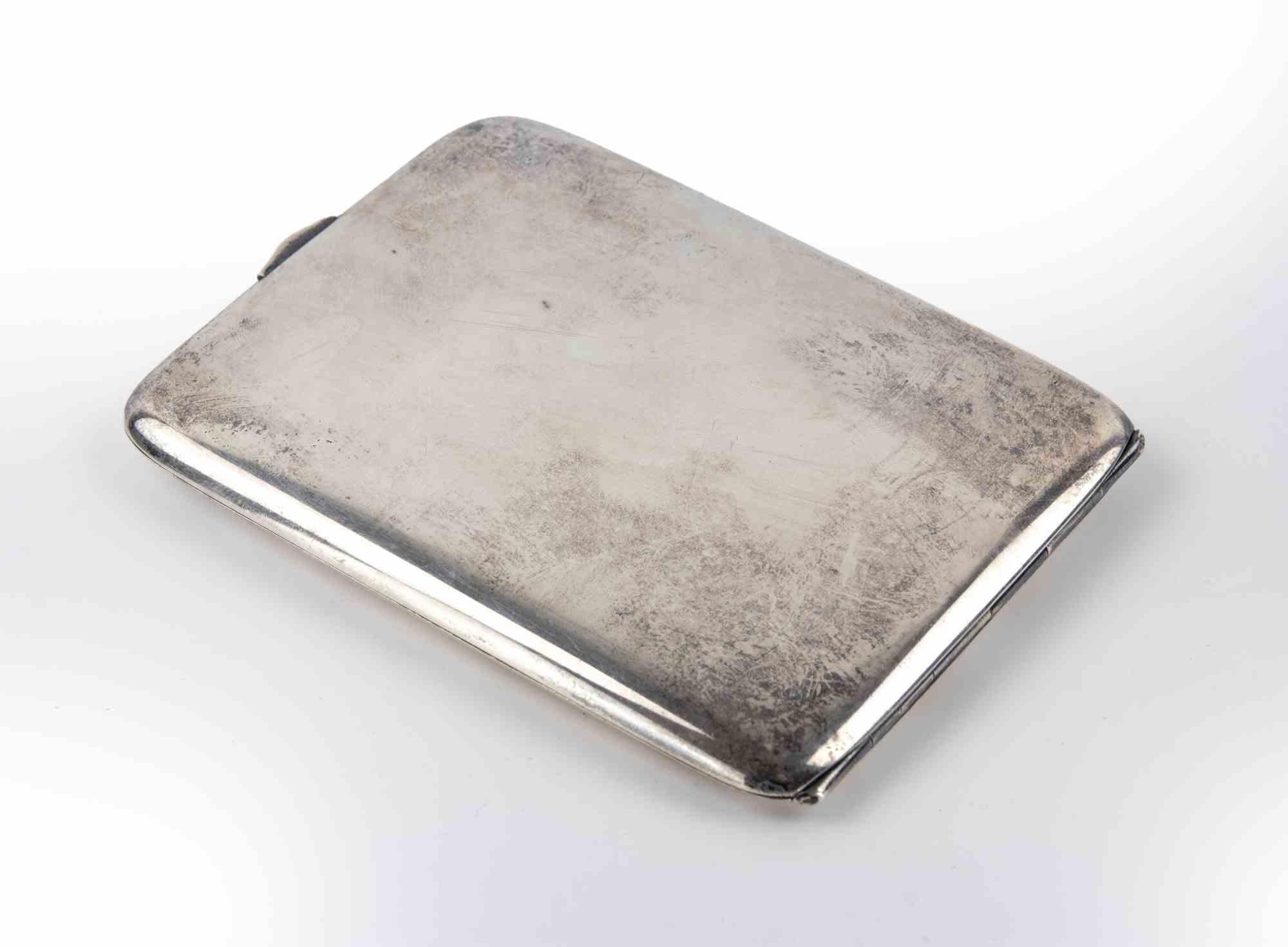 Vintage Wise & Son sterling silver Cigarette Case with 14k gold inlays.

Very good condition.