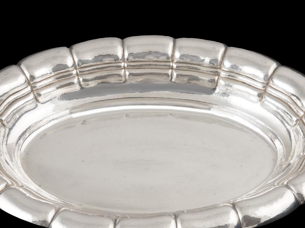 Art Deco Silver Dish by Roelof Citroen, Netherlands, 1969–1983

Elegant oval silver dish crafted by Dutch designer Roelof Citroen, active from 1969 to 1983. Executed in 830‰ silver, this piece showcases the hallmark aesthetics of Art Deco—bold