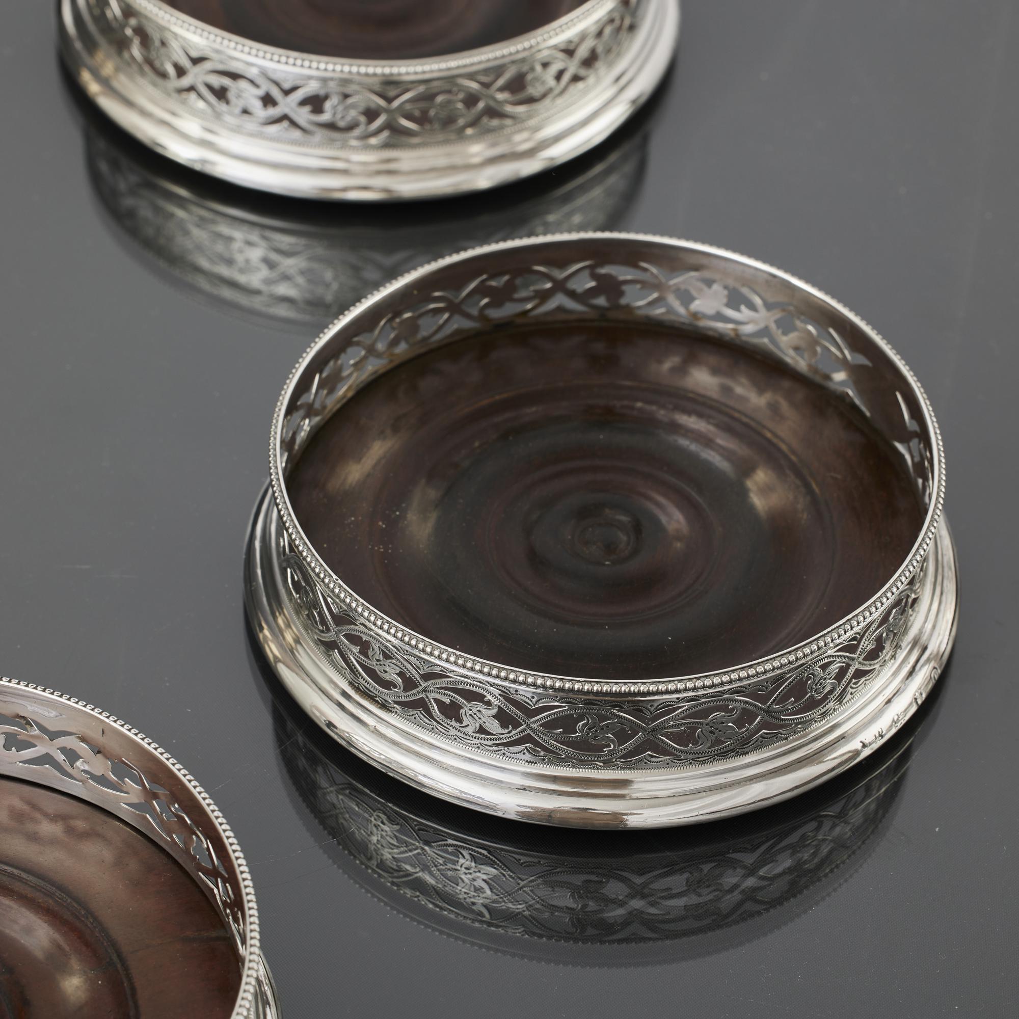 Matched set of four early-George-III pierced silver wine coasters For Sale 3