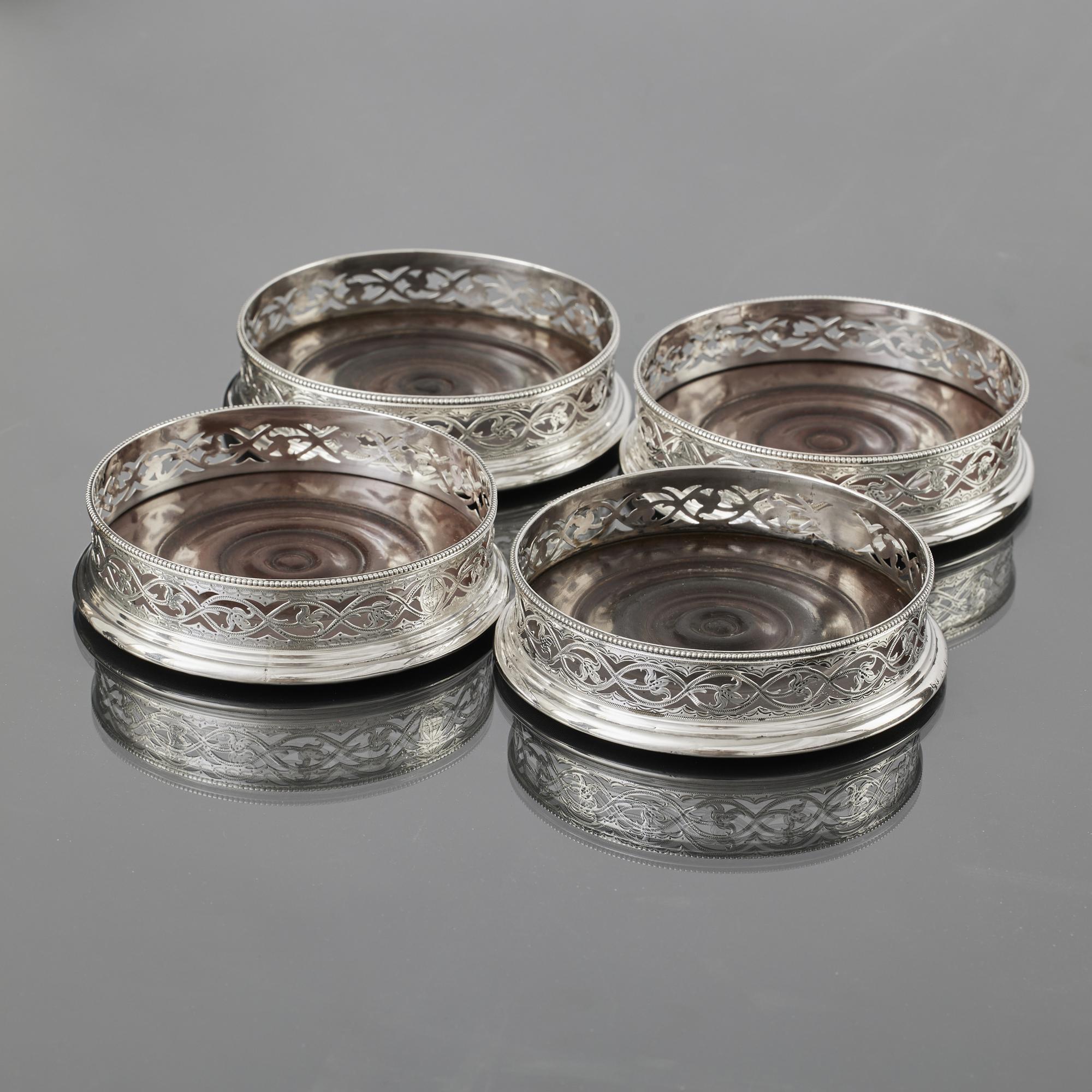George III Matched set of four early-George-III pierced silver wine coasters For Sale