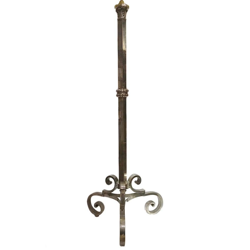 A single 1930's French Neoclassic style, silver-plated floor lamp with tripod base and square column body.

Measurements: 
Height of body: 55
