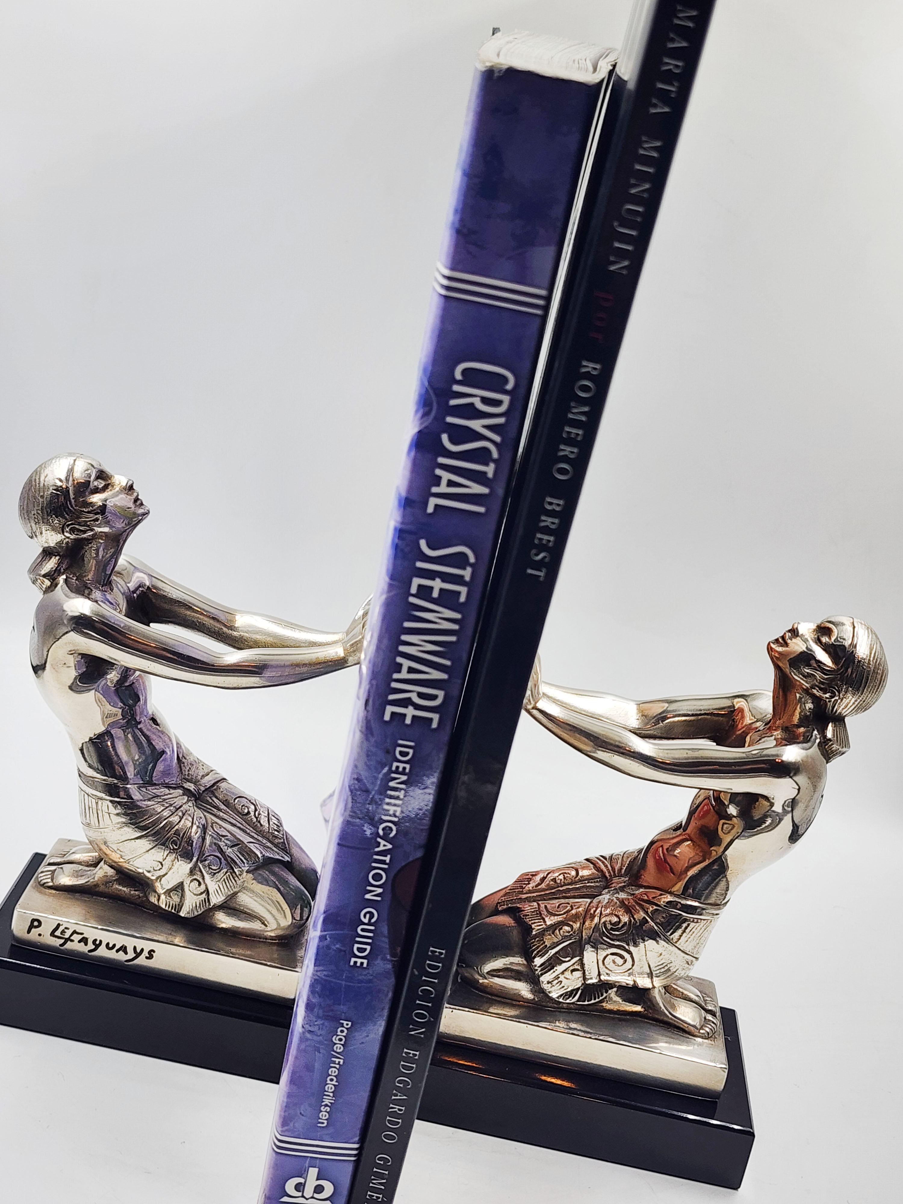 Metal Art Deco silver metal bookends by Pierre Le Faguays For Sale