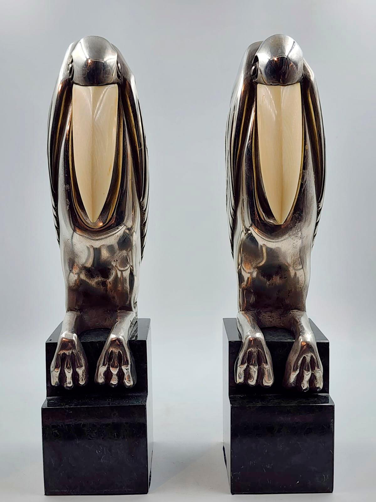 Art Deco Silver Metal Bookends with Malabu by Marcel-André Bouraine

These Art Deco bookends by Marcel Bouraine are playful pieces made of silvered bronze and mounted on marble, which has a step to give more power to the work.

Bouraine made