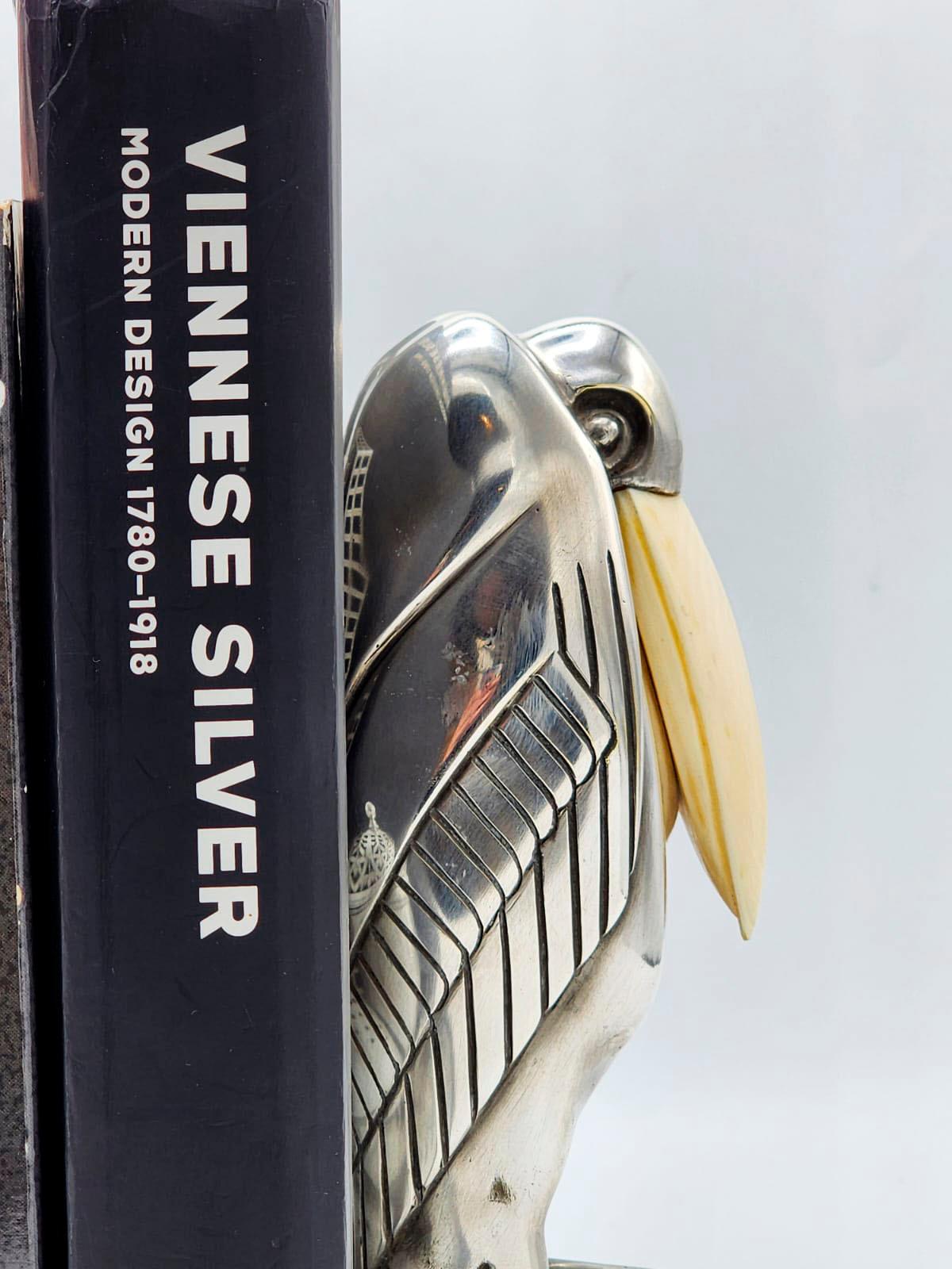 Art Deco Silberne Metall Buchstützen mit Malabu von Marcel-André Bouraine (Handgefertigt) im Angebot