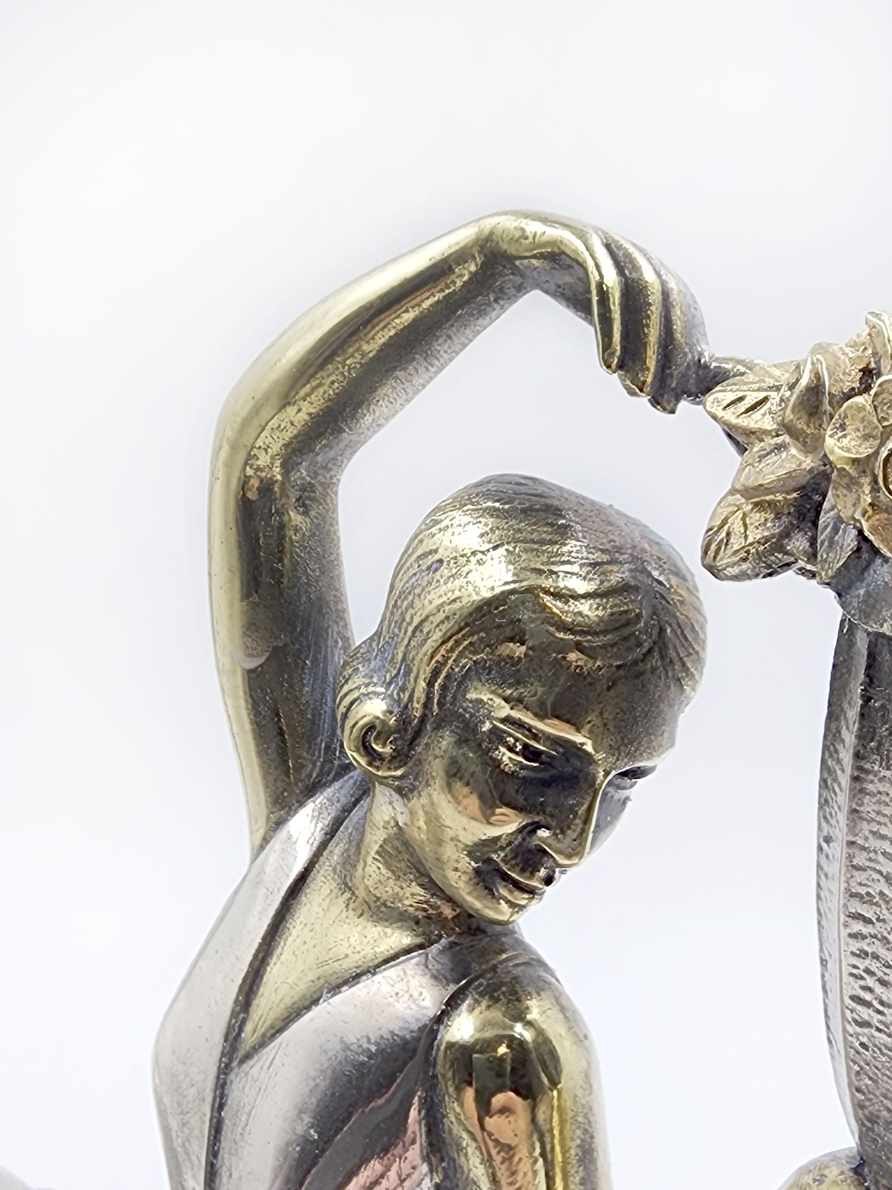 Figura in metallo argentato Art Deco 