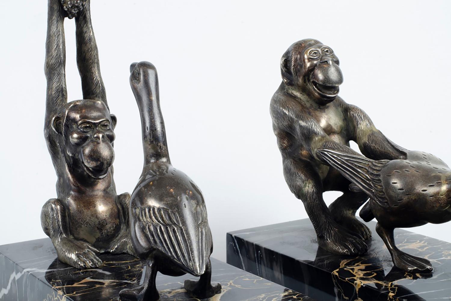 Bronzed Art Deco Silver on Bronze Chimp Pulling Goose Statuette by G.H. Bourcart For Sale