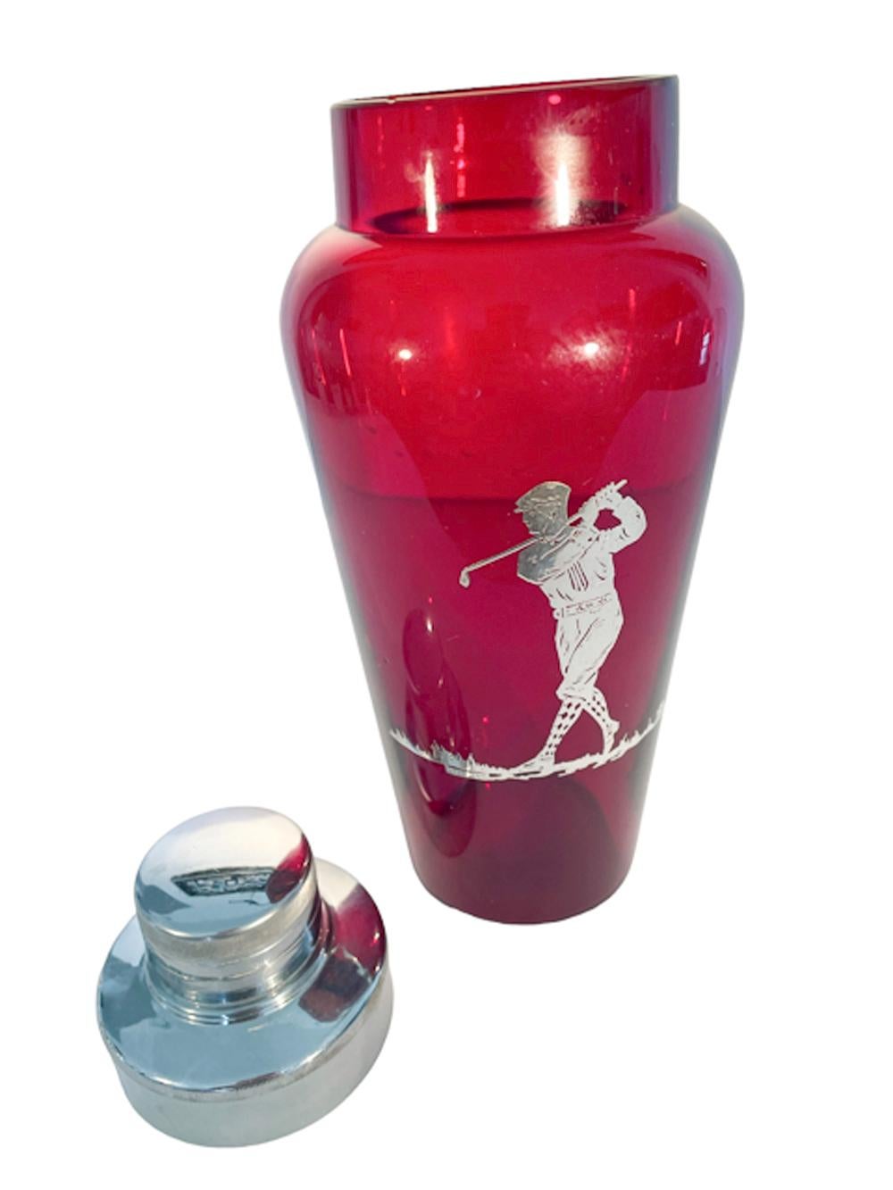 Art Deco silver overlay ruby red glass golf themed cocktail shaker with a two-part chrome center pour lid with integral strainer.