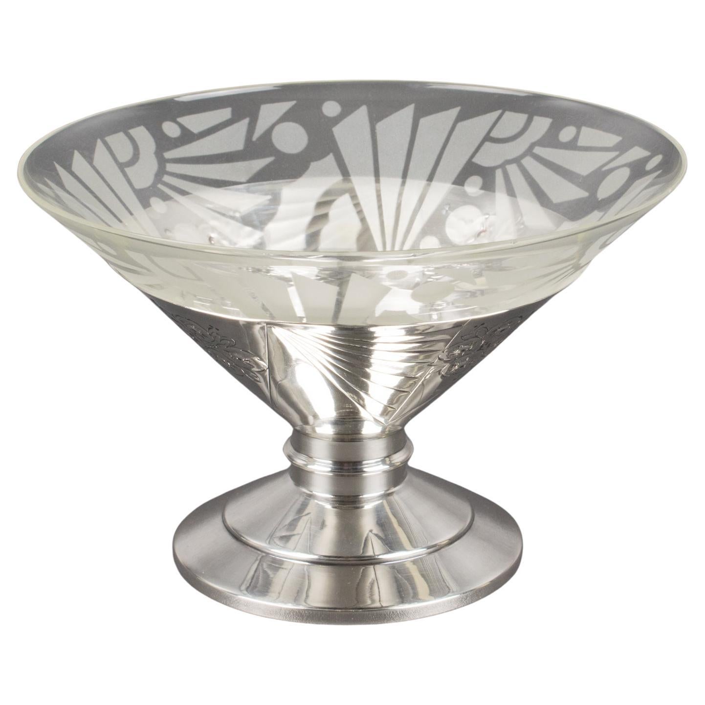 The French silversmith SFAM, Paris (Société Française d'Alliages et de Métal), designed this stunning Art Deco centerpiece or serving bowl. The rare piece was crafted in France circa 1930. The tall pedestal is made of silver-plated metal with a