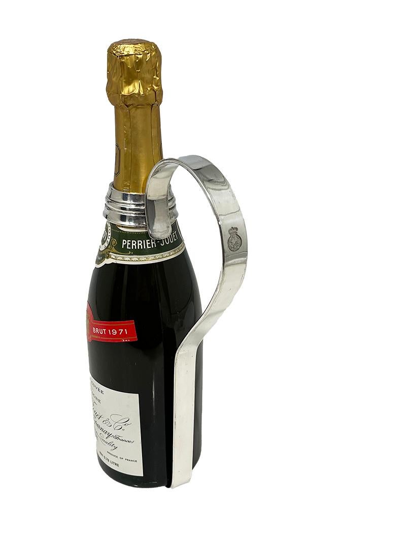 Portabottiglie per champagne in argento Art Deco di Elkington per KHL, 1912-1936

Portabottiglie in argento per Champagne realizzato da Elkington England per l'olandese Koninklijke Hollandsche Lloyd (KHL) tra il 1912 e il 1936.
La Koninklijke