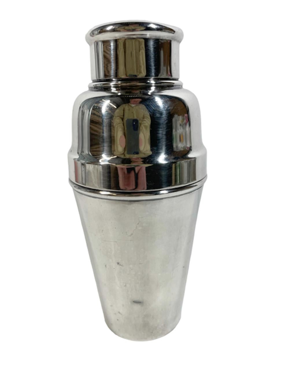 Art Deco three-piece silver plate cocktail shaker by William Suckling, of cobbler type, with citrus juicer inside domed lid.