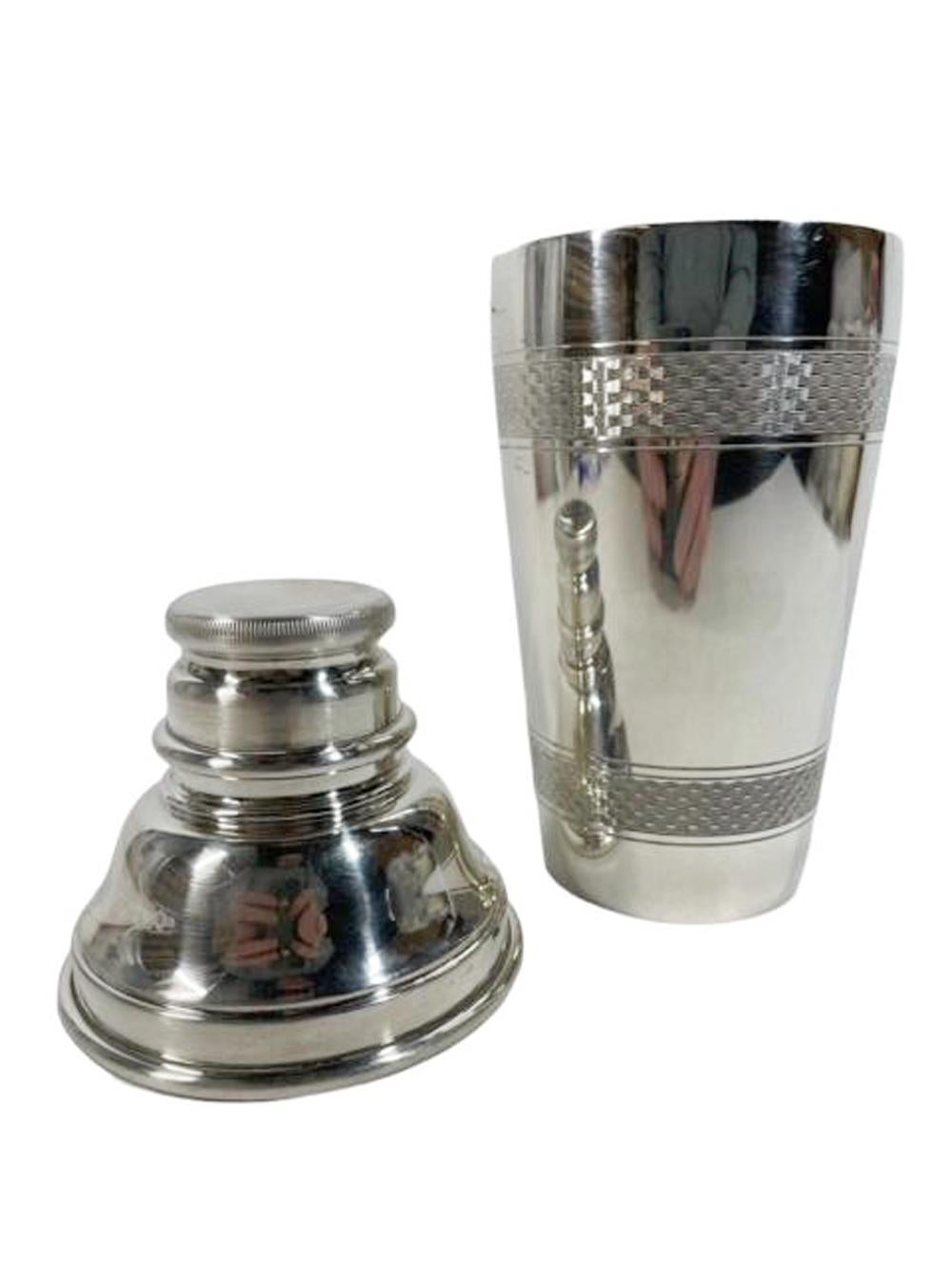 Art Deco silver plate cocktail shaker of cobbler form and having bands of engine turned decoration. 