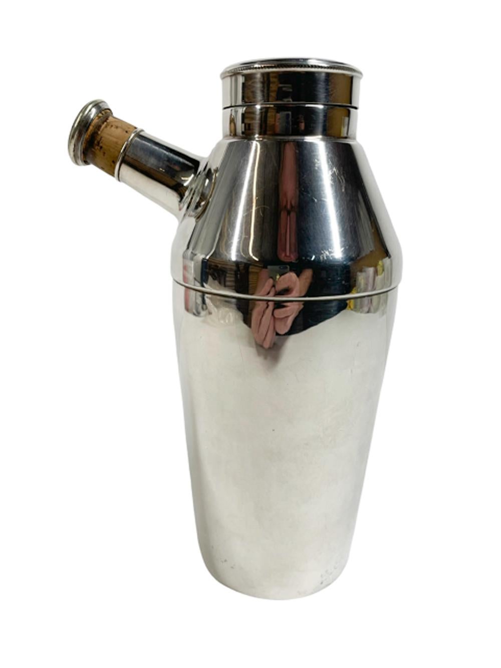 Art Deco silver plate cocktail shaker by Elkington & Co. with a tapered body and conical top with disk form cover and angled pour spout with silver plate capped cork stopper.