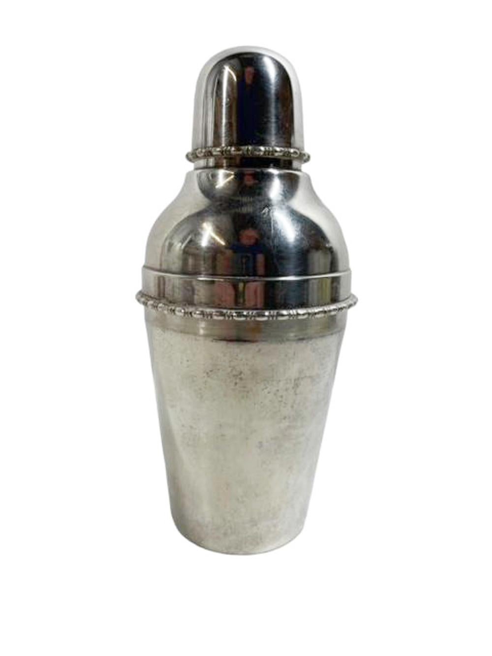 English Art Deco silver plate cobbler type cocktail shaker by Martin Hall with domed cap and beadwork detail to the edge of the lid and cap. Marked on the bottom M.H. in a rectangle below the number 4.