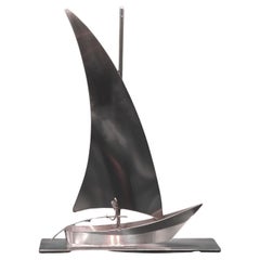 Velero Art Déco plateado con pescador de Hagenauer