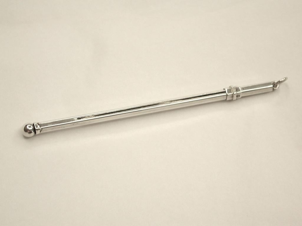 Art Deco silver swizzle stick.
Ideal for the person who has everything.
Useful as well, to remove some of the bubbles in your
champagne glass.