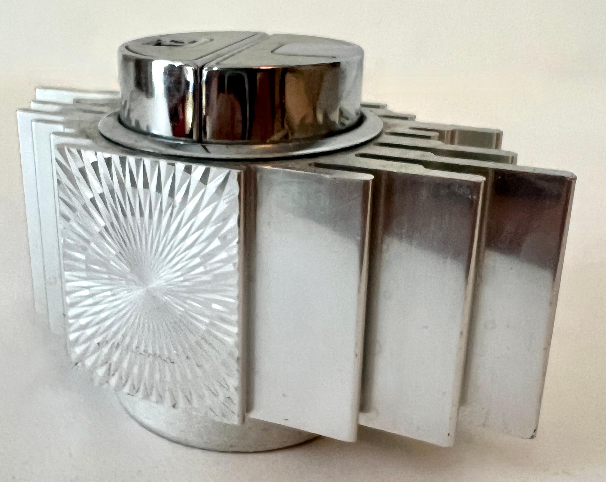 A wonderful Aluminum Art Deco Table lighter by Saroma, made in Japan, 1960.

A compliment to the cocktail table, desk or side table - in any room.  The lighter is perfect for Cigars, cigarettes, and 420!

A stunning and special piece.. in good