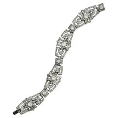 Art Deco Silberfarbenes Link-Armband mit Baguette und runden Strasssteinen
