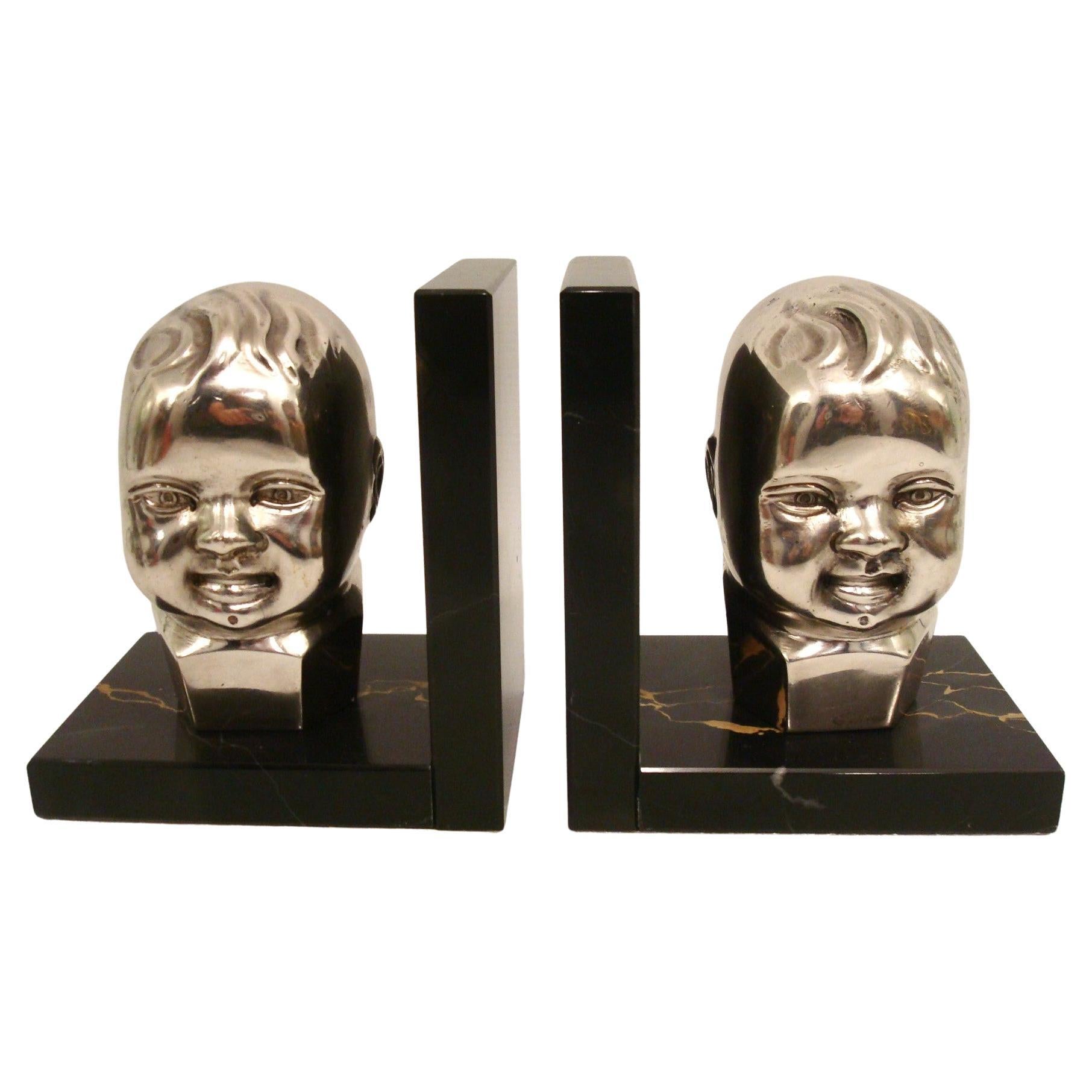 Art Deco Silvered Bronze Baby Bust Bookends. 1920´s For Sale