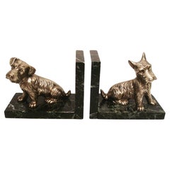 Serre-livres Art Déco en bronze argenté représentant des terriers écossais