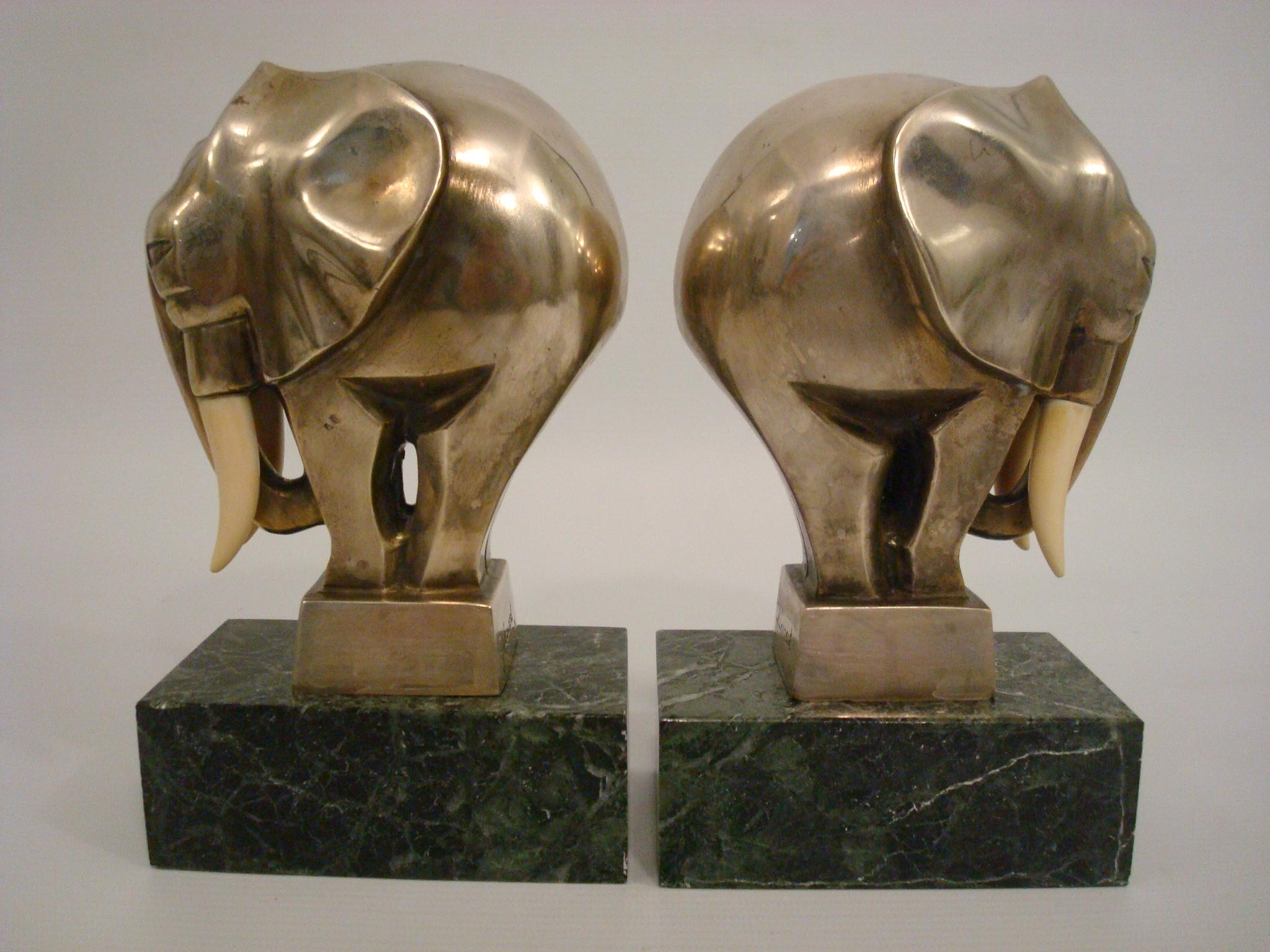Art Deco silvered bronze elephant figure / sculpture bookends signed G. H. Laurent and stamped 24, France, 1920s. Perfect desk piece. Nice and heavy bronze bookends mounted over Green marble bases.
Excellent quelity.