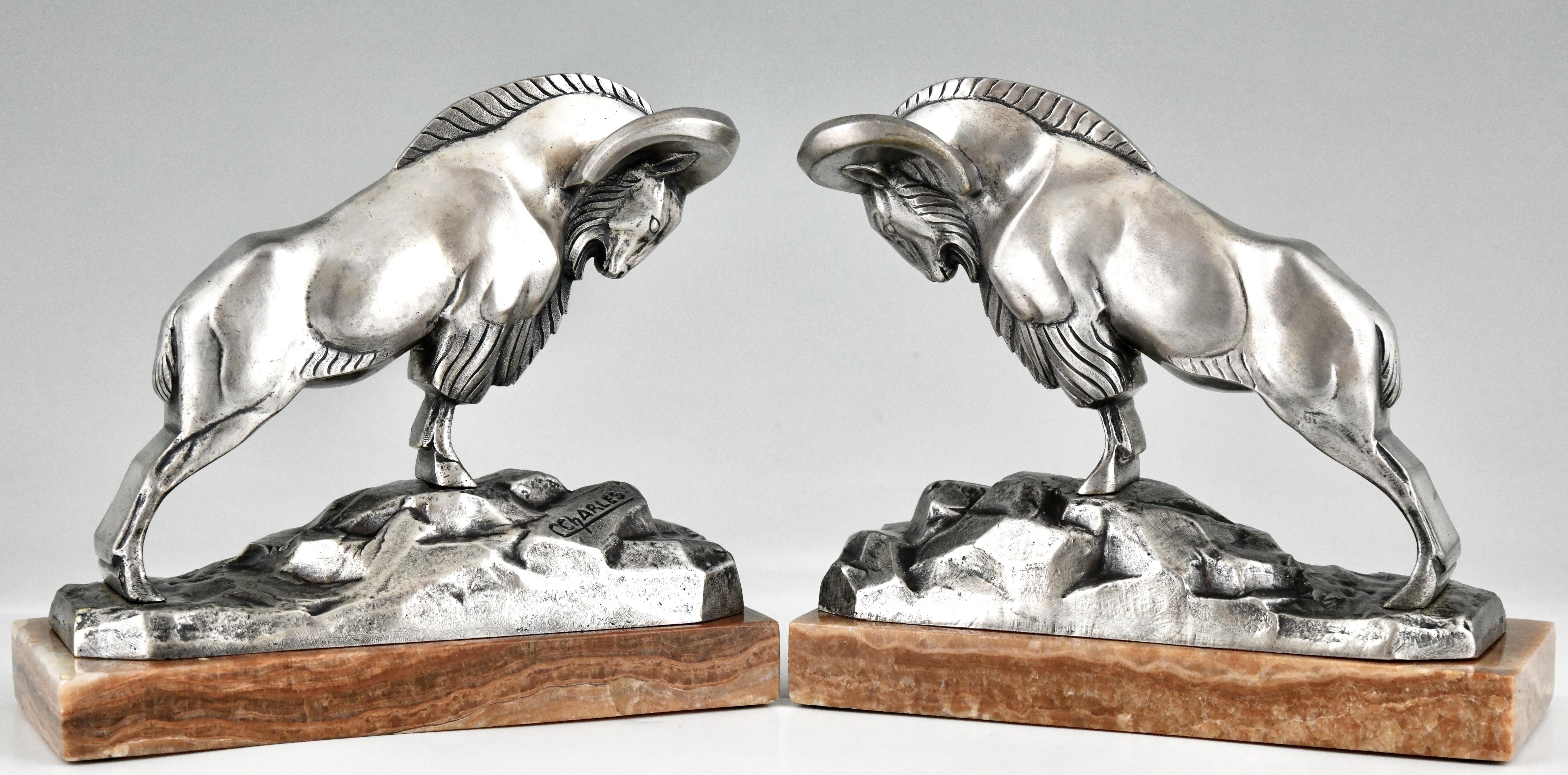 Art Deco silvered bronze ibex bookends signed by C. Charles.
With Patrouilleau foundry mark. 
Silvered bronze on a marble base. 
France 1925. 

Literature:
The dictionary of sculptors in bronze, James Mackay. Antique collectors club.
Dictionnaire