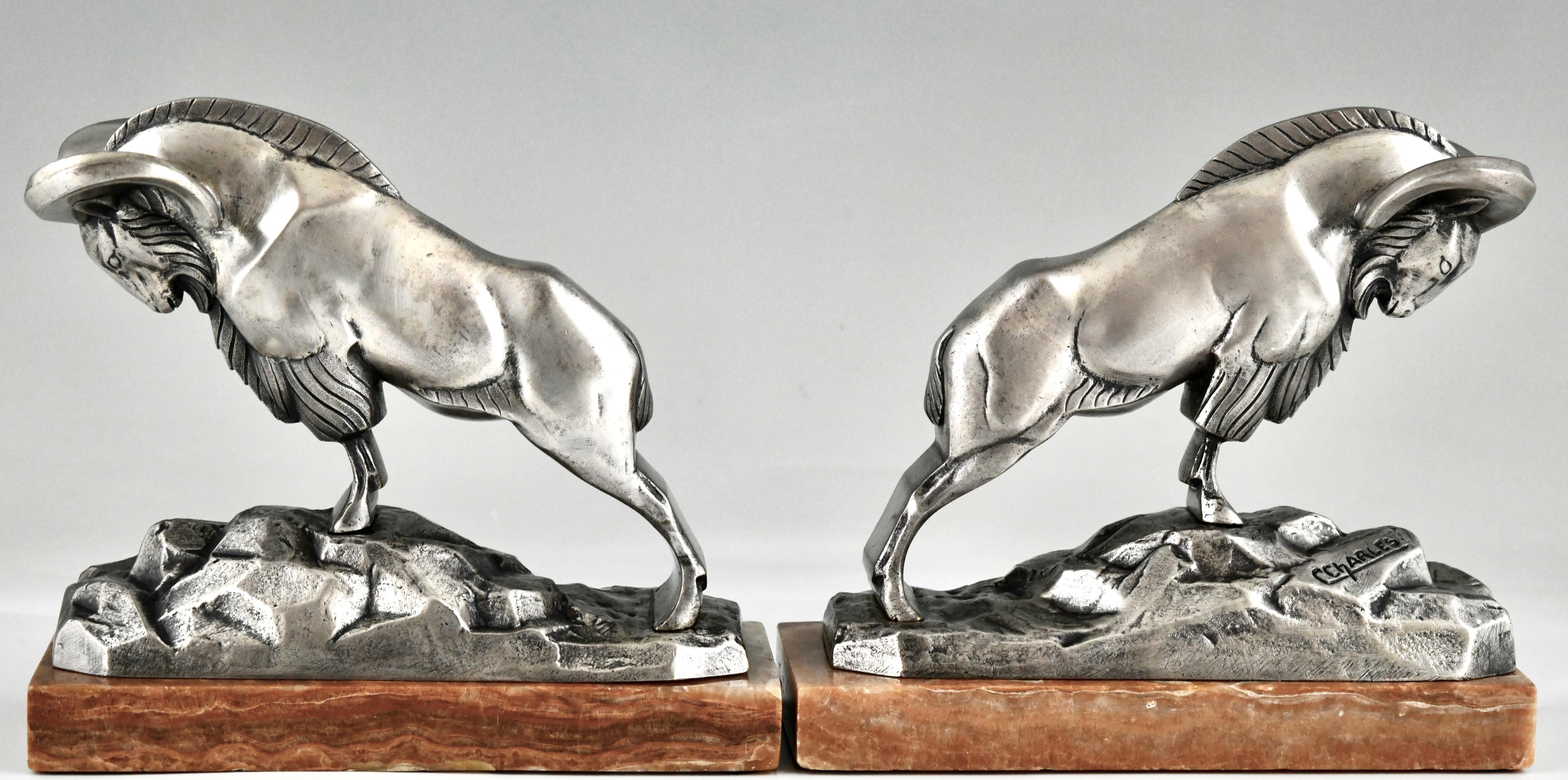 Silvered Art Deco silvered bronze ibex bookends signed by C. Charles. For Sale