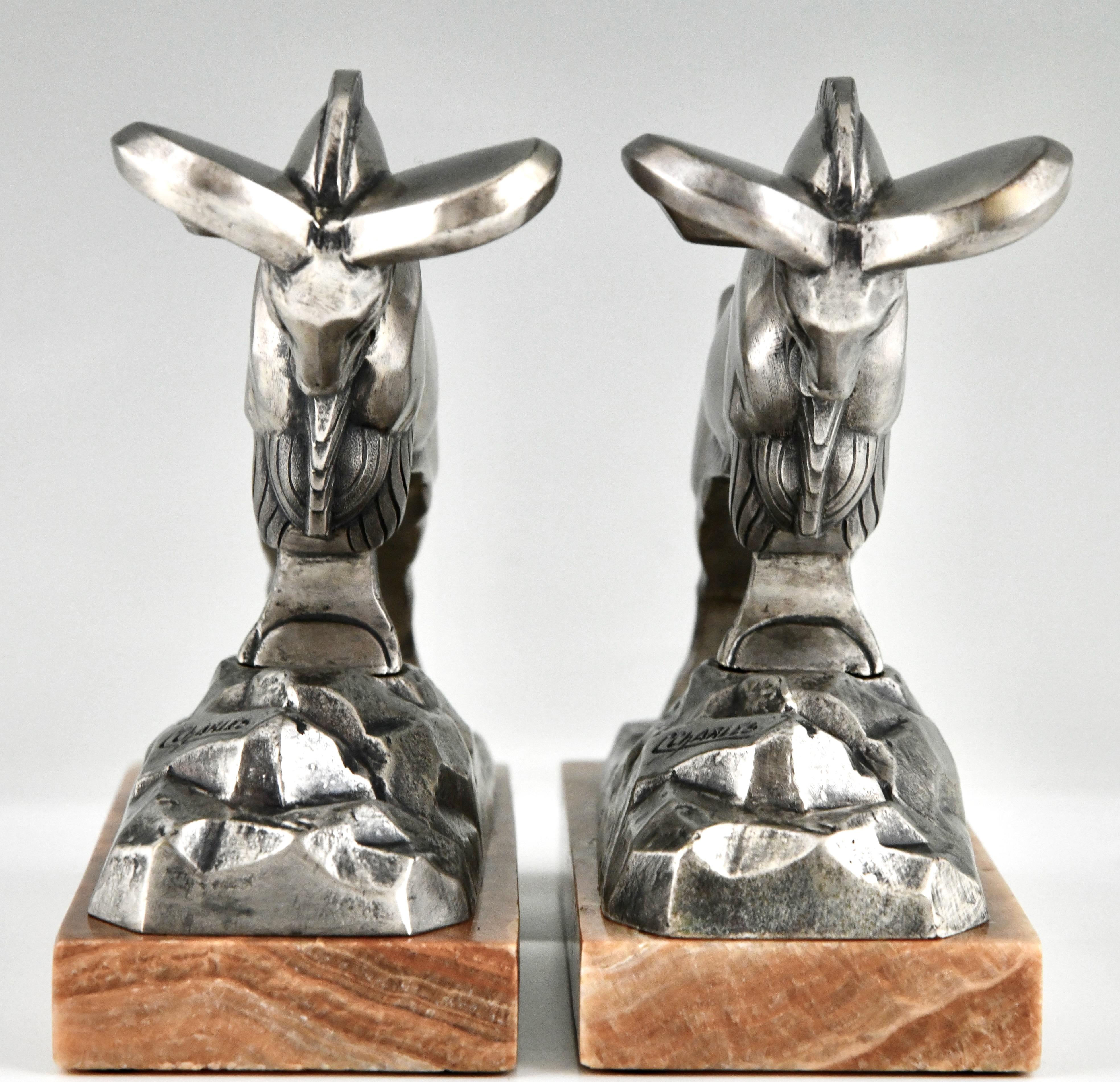 Art Deco silvered bronze ibex bookends signed by C. Charles. In Good Condition For Sale In Antwerp, BE