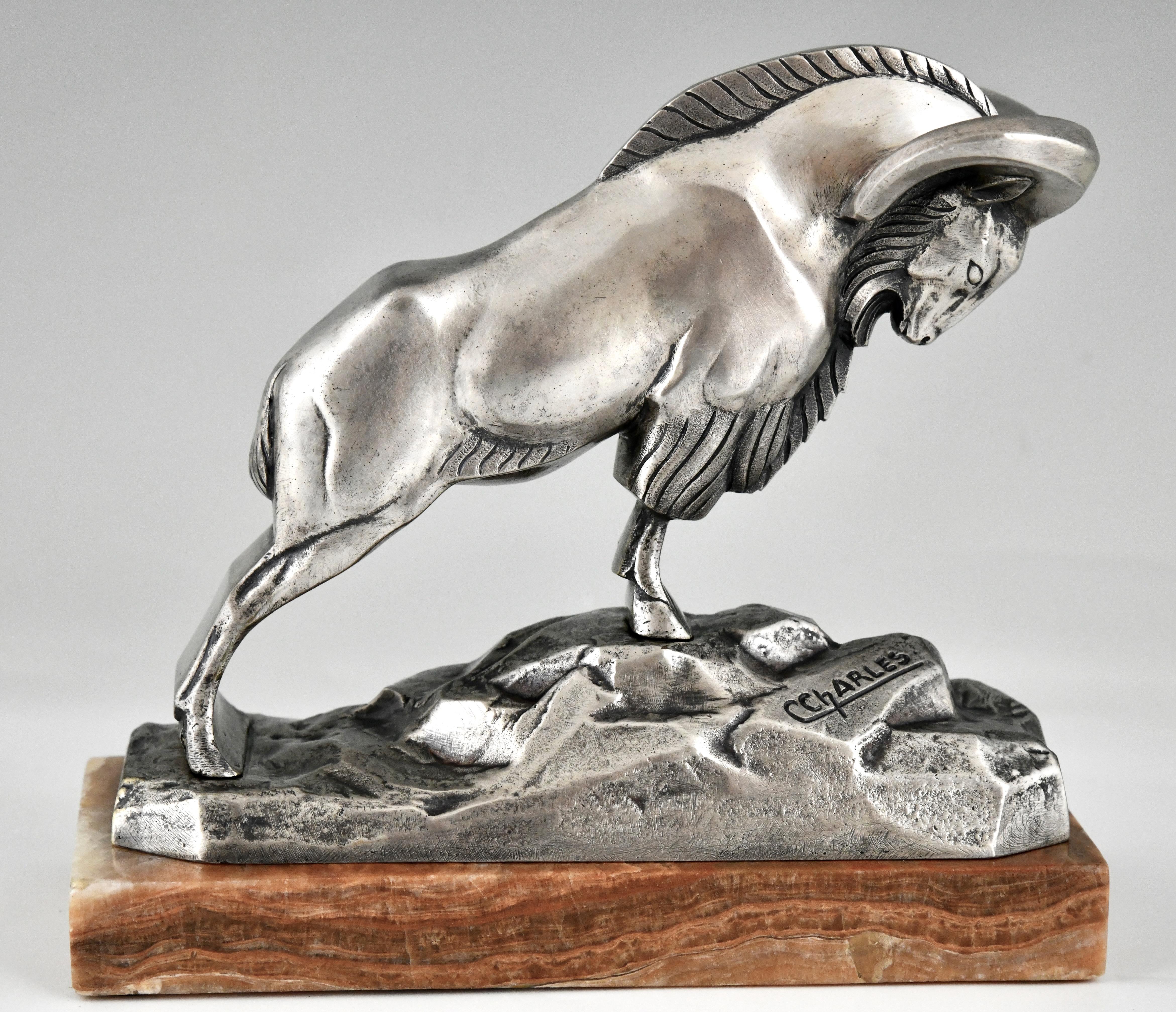 Début du 20ème siècle Serre-livres Art déco en ibex bronze argenté signé par C. Charles. en vente