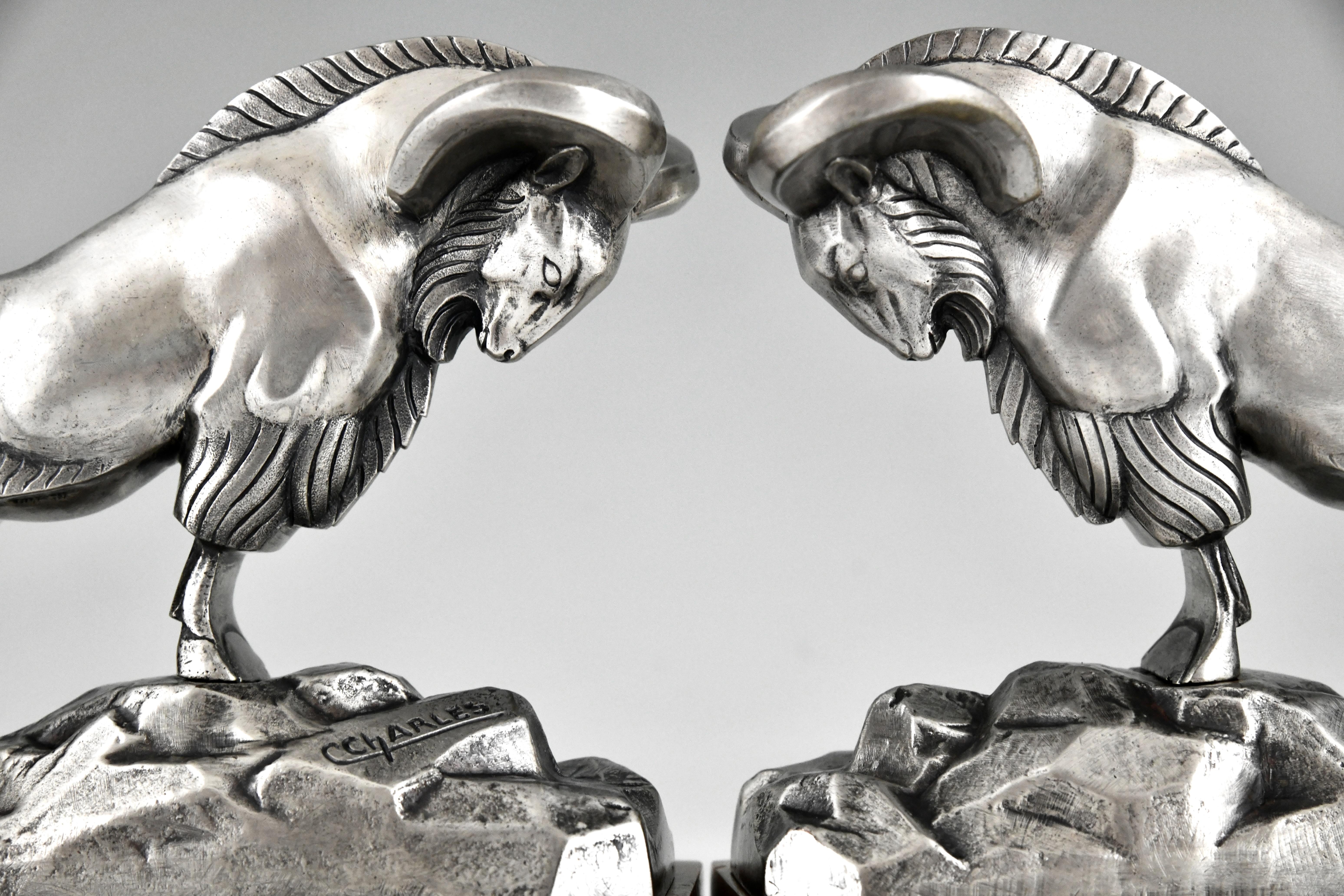 Art Deco silvered bronze ibex bookends signed by C. Charles. For Sale 1