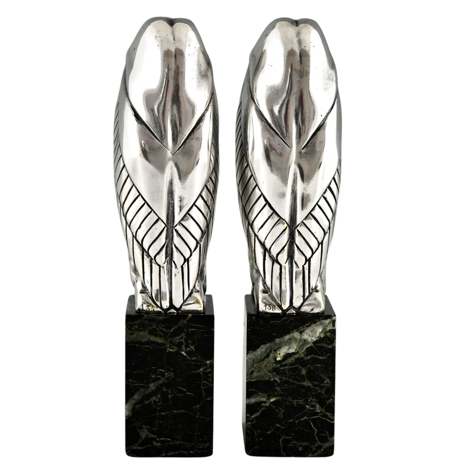 Argentato Reggilibri Art Deco in bronzo argentato con cicogna Marabù di Marcel Bouraine Francia 1925 in vendita